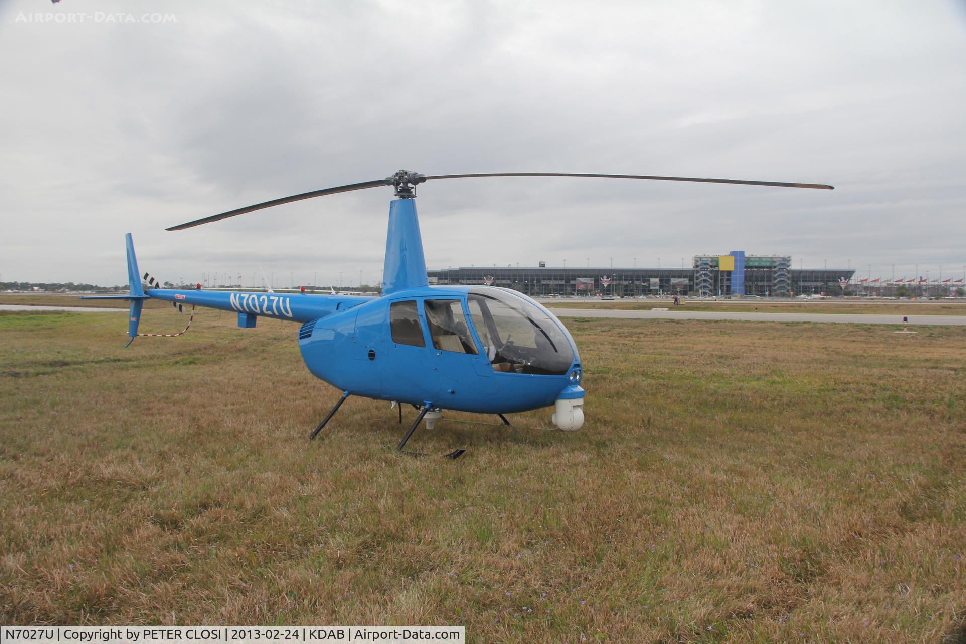 N7027U, 1998 Robinson R44 C/N 0514, Sky13 waiting for the TFR over the Daytona 500 to lift.