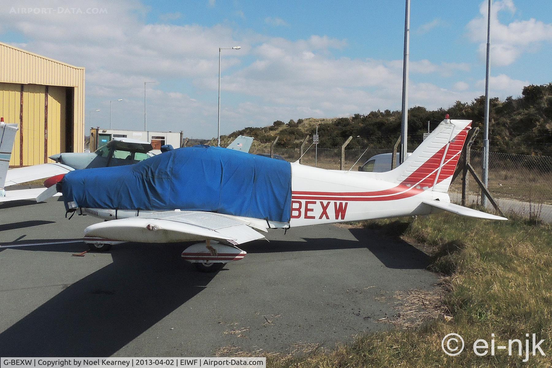 G-BEXW, 1977 Piper PA-28-181 Cherokee Archer II C/N 28-7790521, Photographed on the light aircraft ramp at Waterford Airport.