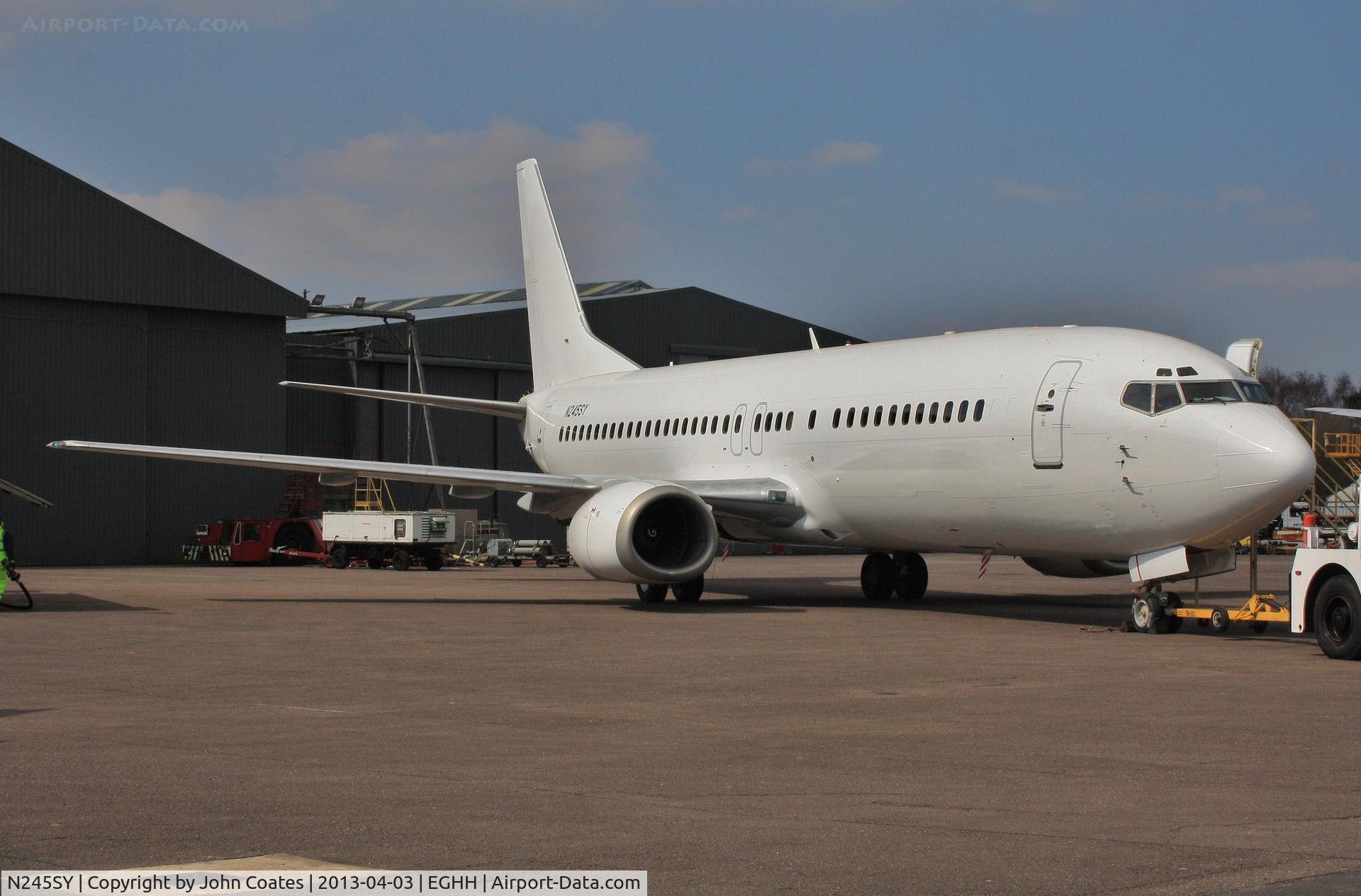 N245SY, 1993 Boeing 737-476 C/N 24445, Preparing to depart European apron after respray white