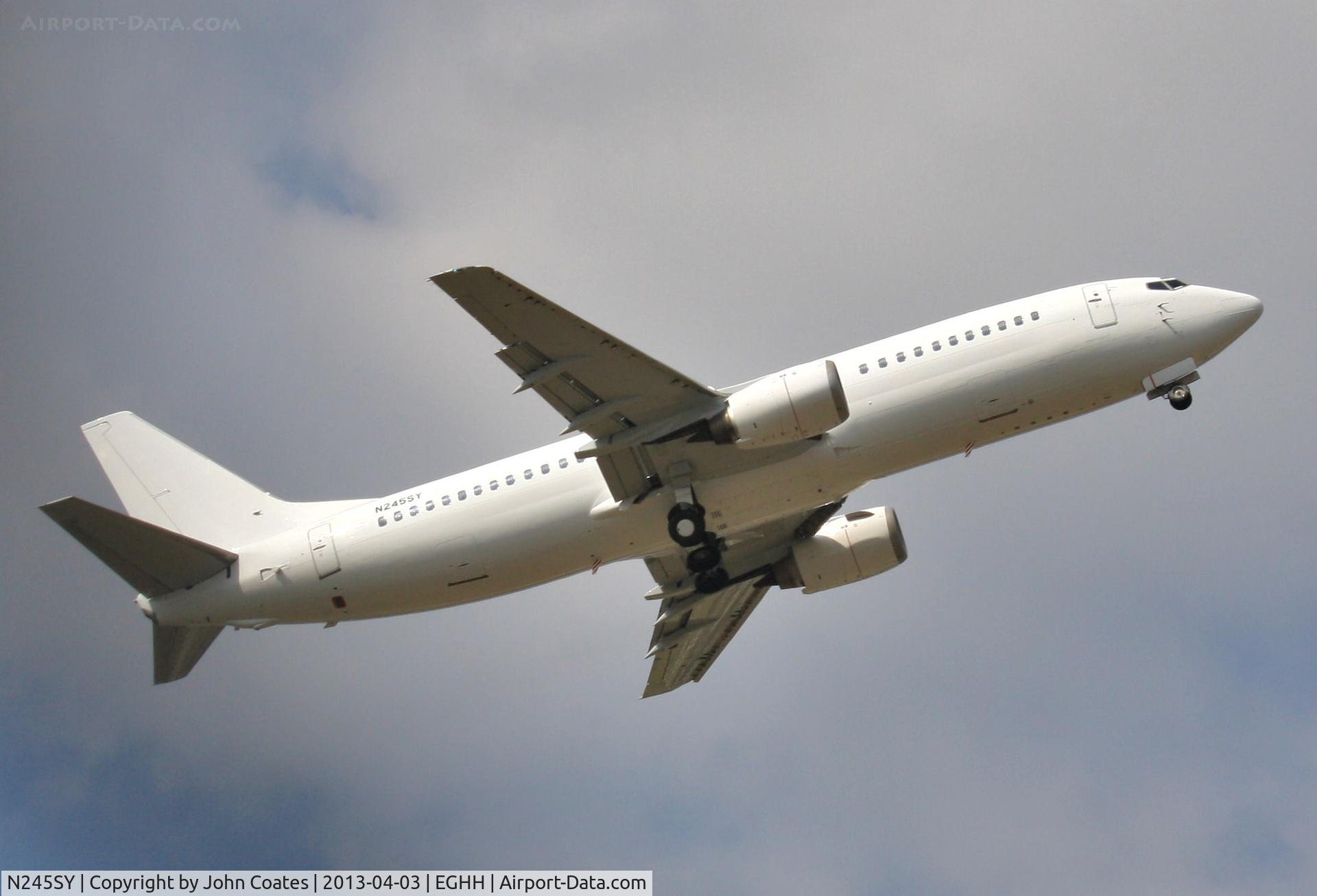 N245SY, 1993 Boeing 737-476 C/N 24445, Departing after respray white for Al Sayegh Group