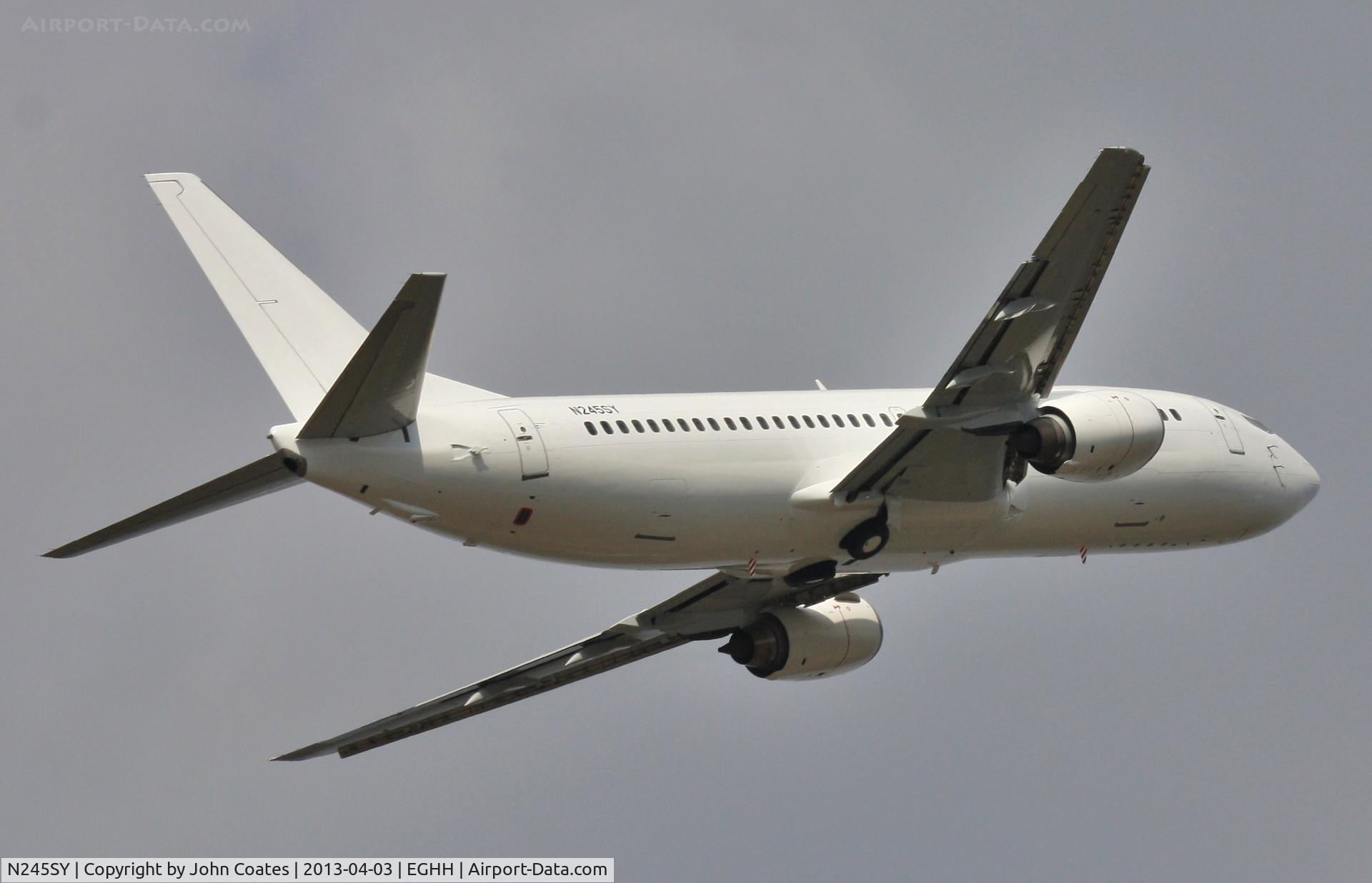 N245SY, 1993 Boeing 737-476 C/N 24445, Departing after respray white for Al Sayegh Group