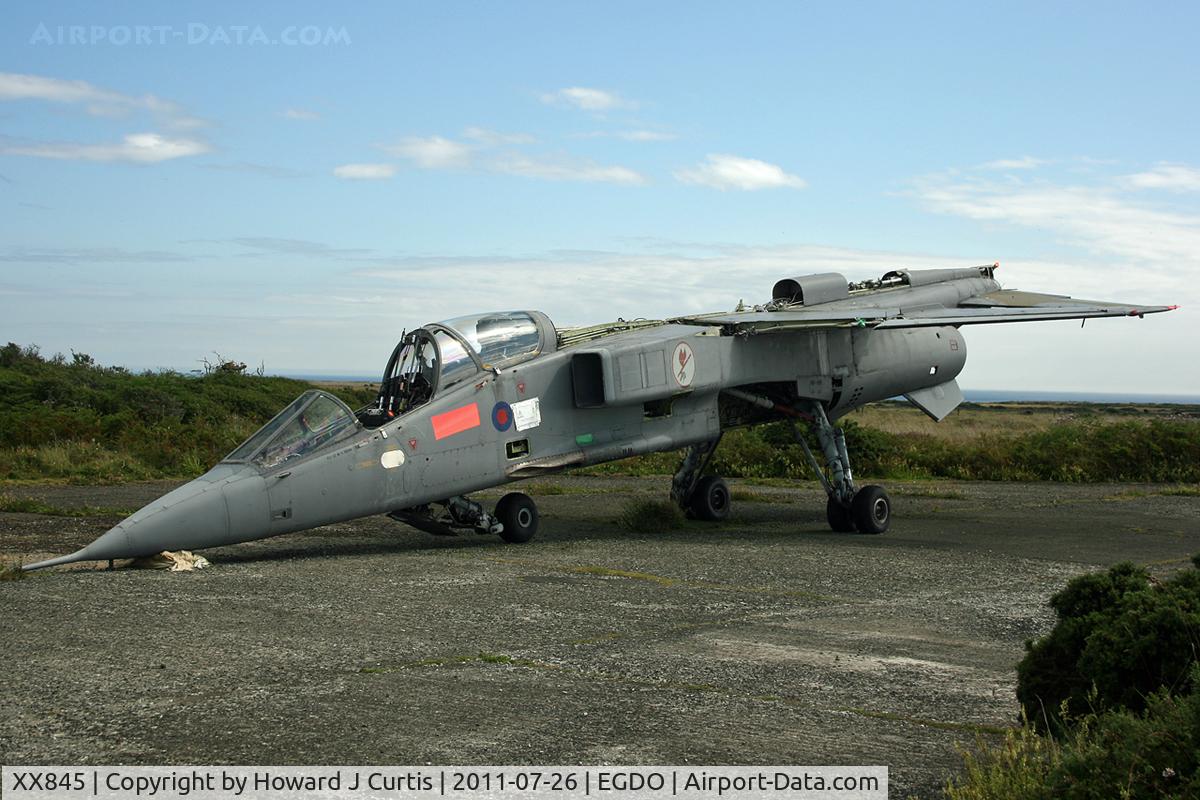 XX845, 1975 Sepecat Jaguar T.4 C/N B.33, Coded EV. At the Fire School, Predannack.
