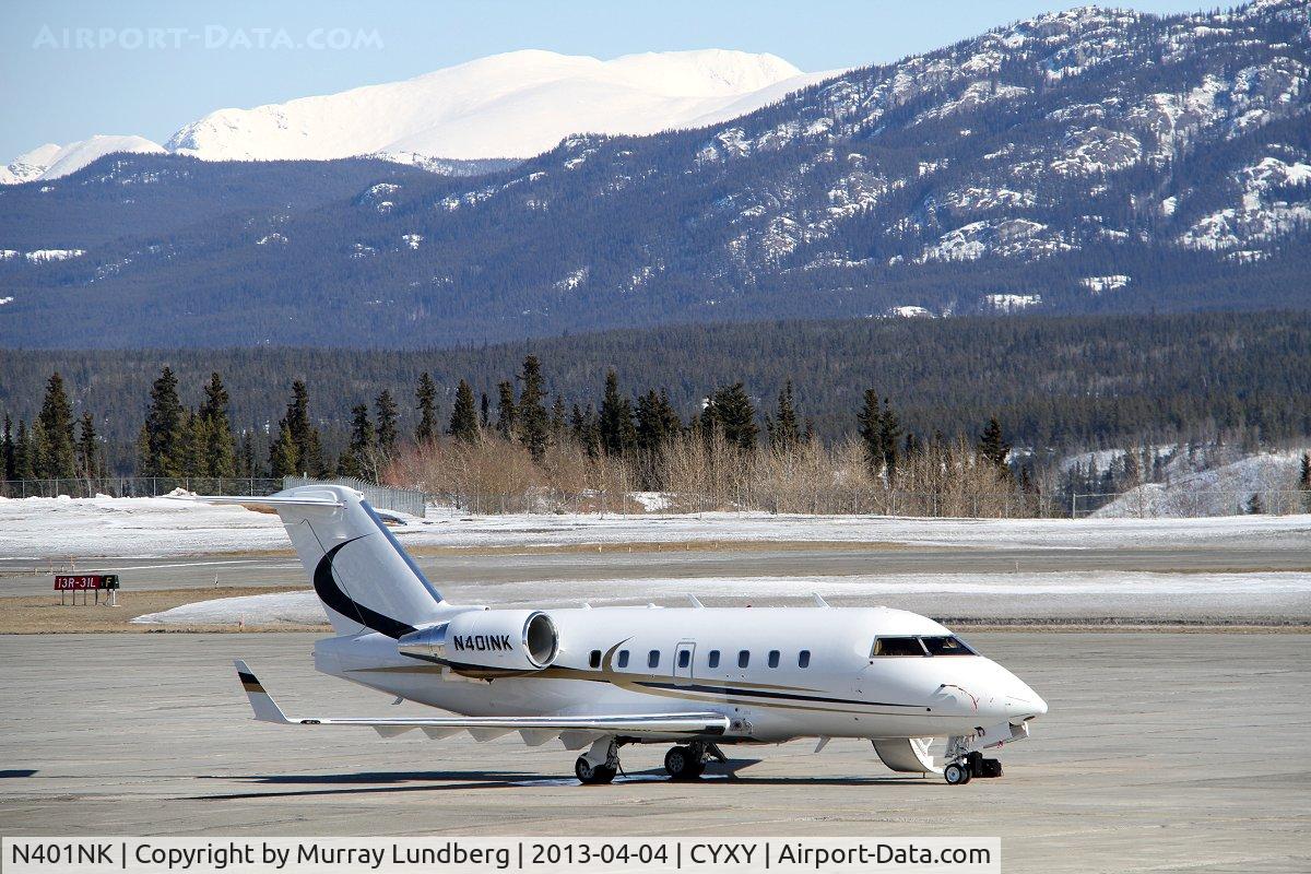 N401NK, 1999 Bombardier Challenger 604 (CL-600-2B16) C/N 5409, On the ramp at Whitehorse, Yukon.