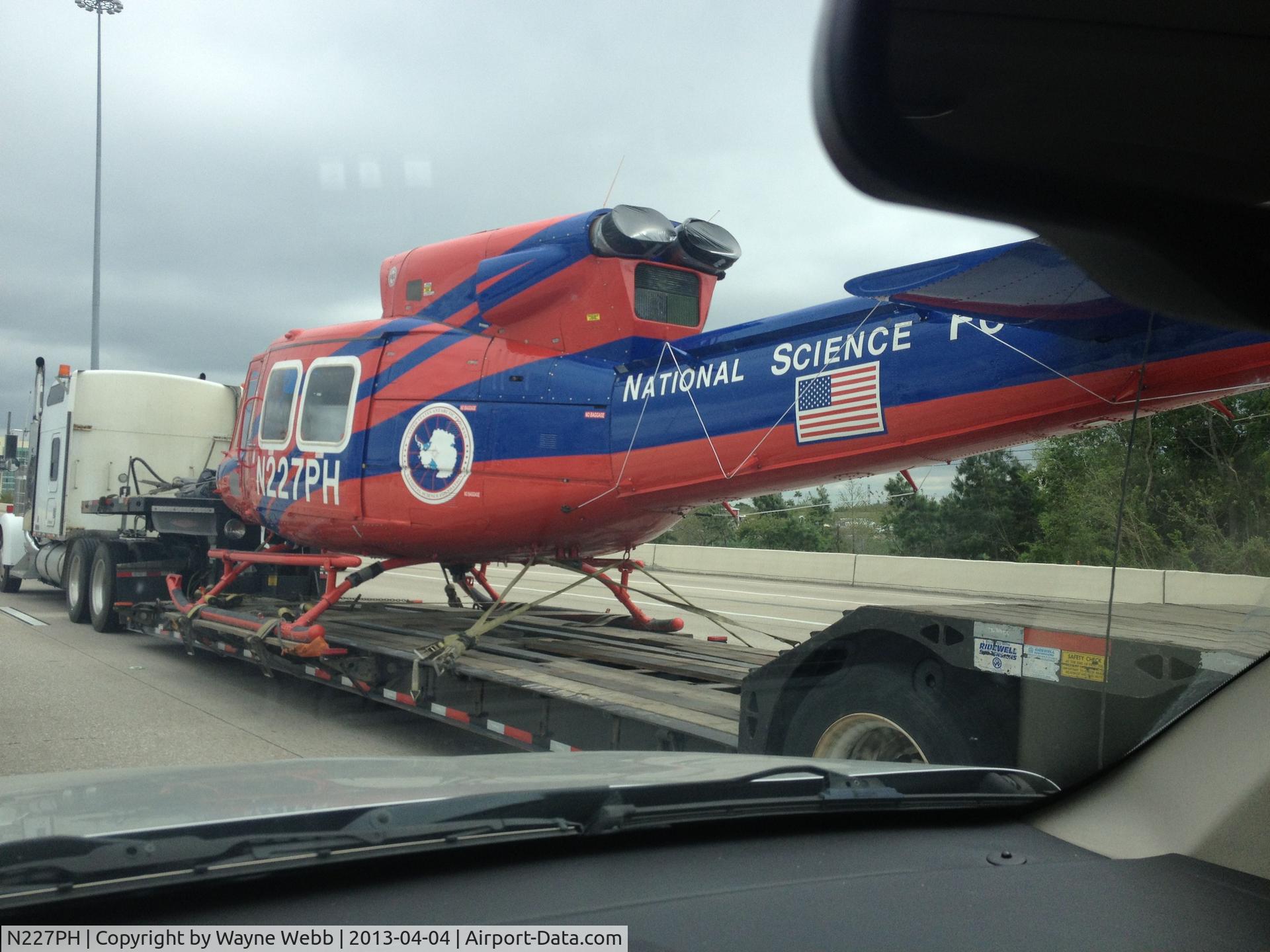 N227PH, 1979 Bell 212 C/N 30953, aircraft on truck --I-10 in west Houston