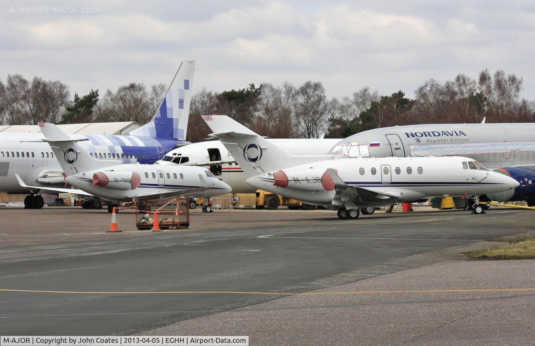 M-AJOR, 2008 Hawker Beechcraft 900XP C/N HA-0058, With stablemate M-INOR on the apron