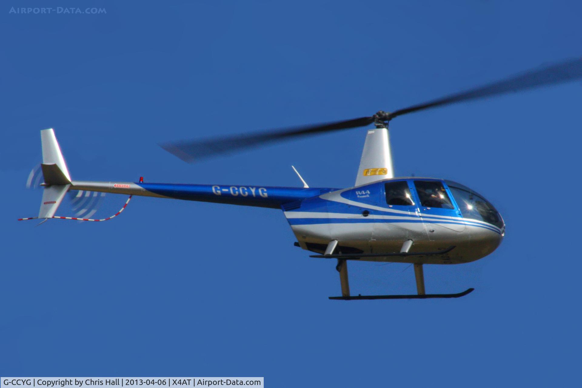 G-CCYG, 2004 Robinson R44 Raven II C/N 10424, Ferrying racegoers into Aintree for the 2013 Grand National