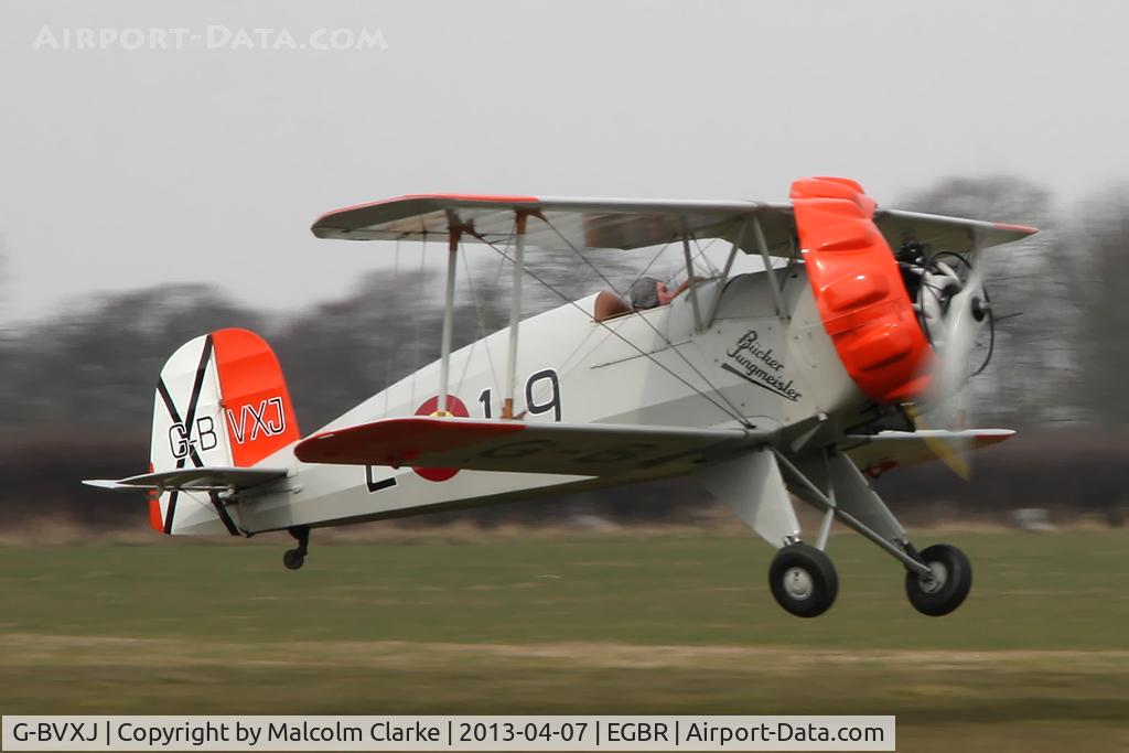 G-BVXJ, 1937 Bucker Bu-133C Jungmeister C/N E-19, CASA 1-133C Jungmeister G-BVXJ at The Real Aeroplane Clubs Spring Fly-In, April 2013. A problem with the engine cowling brought its display to an early end. The aircraft landed safely.
