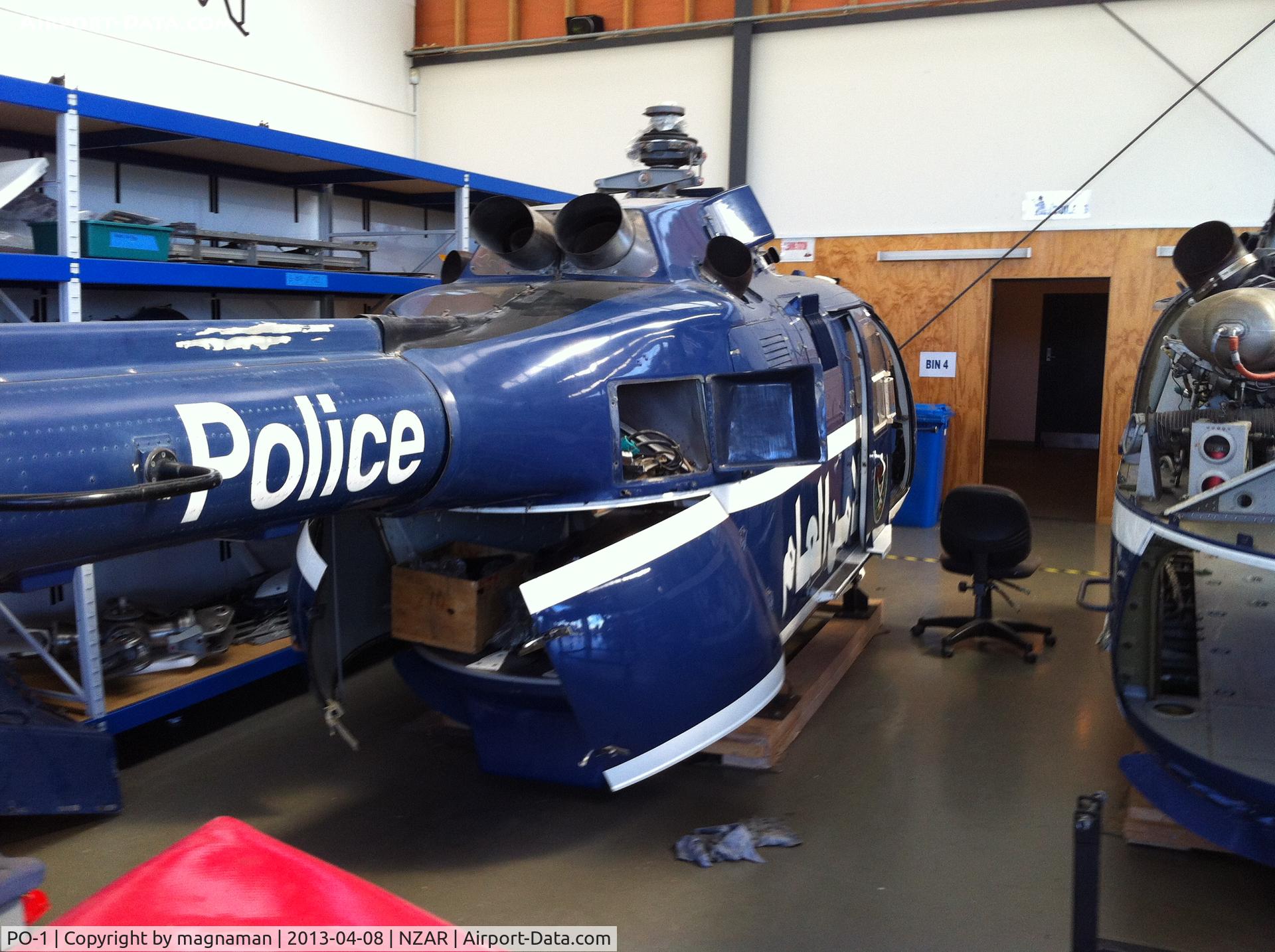 PO-1, MBB Bo-105 C/N S-797, View from the rear in this busy hangar!
