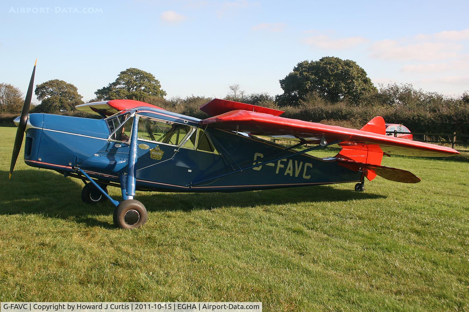 G-FAVC, 1935 De Havilland DH.80A Puss Moth C/N 225, Privately owned. One wing folded. Notice the flap on top of the wing.