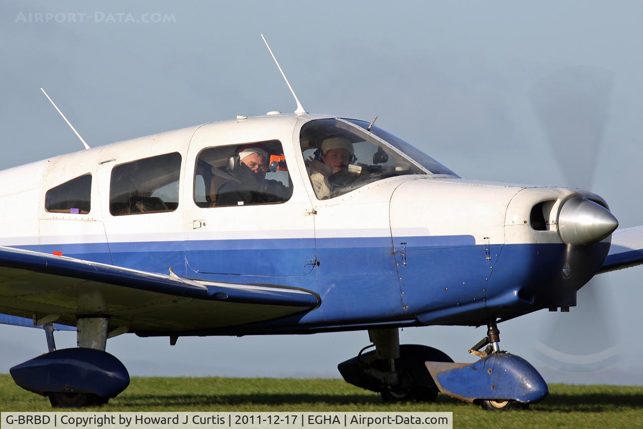G-BRBD, 1974 Piper PA-28-151 Cherokee Warrior C/N 28-7415315, Festive wear and a pleasant wave. The aircraft is a resident here.