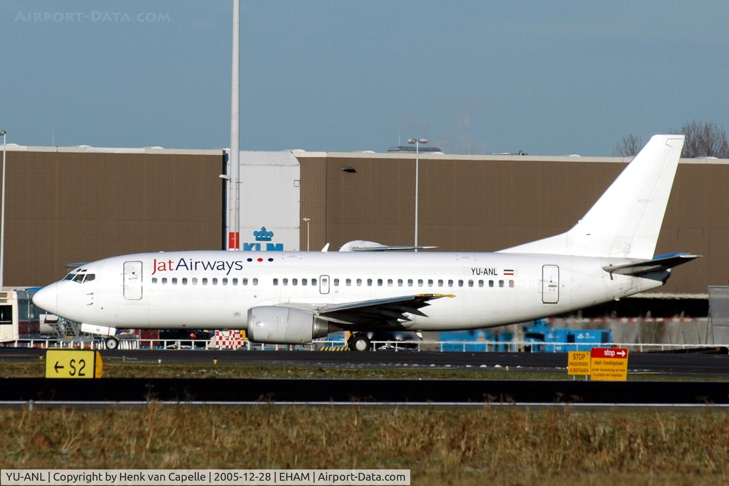 YU-ANL, 1986 Boeing 737-3H9 C/N 23716/1321, JAT Airways Boeing 737-300 taxying at Amsterdam Schiphol airport, the Netherlands. The three dots on its tail are missing.