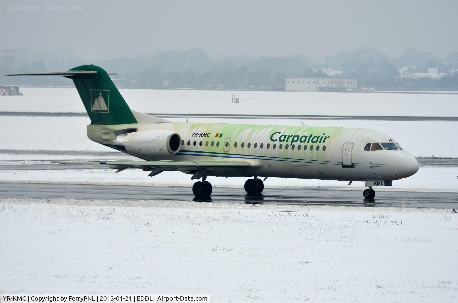 YR-KMC, 1996 Fokker 70 (F-28-0070) C/N 11569, De-icing fluids give this Fk70 a shabby look.