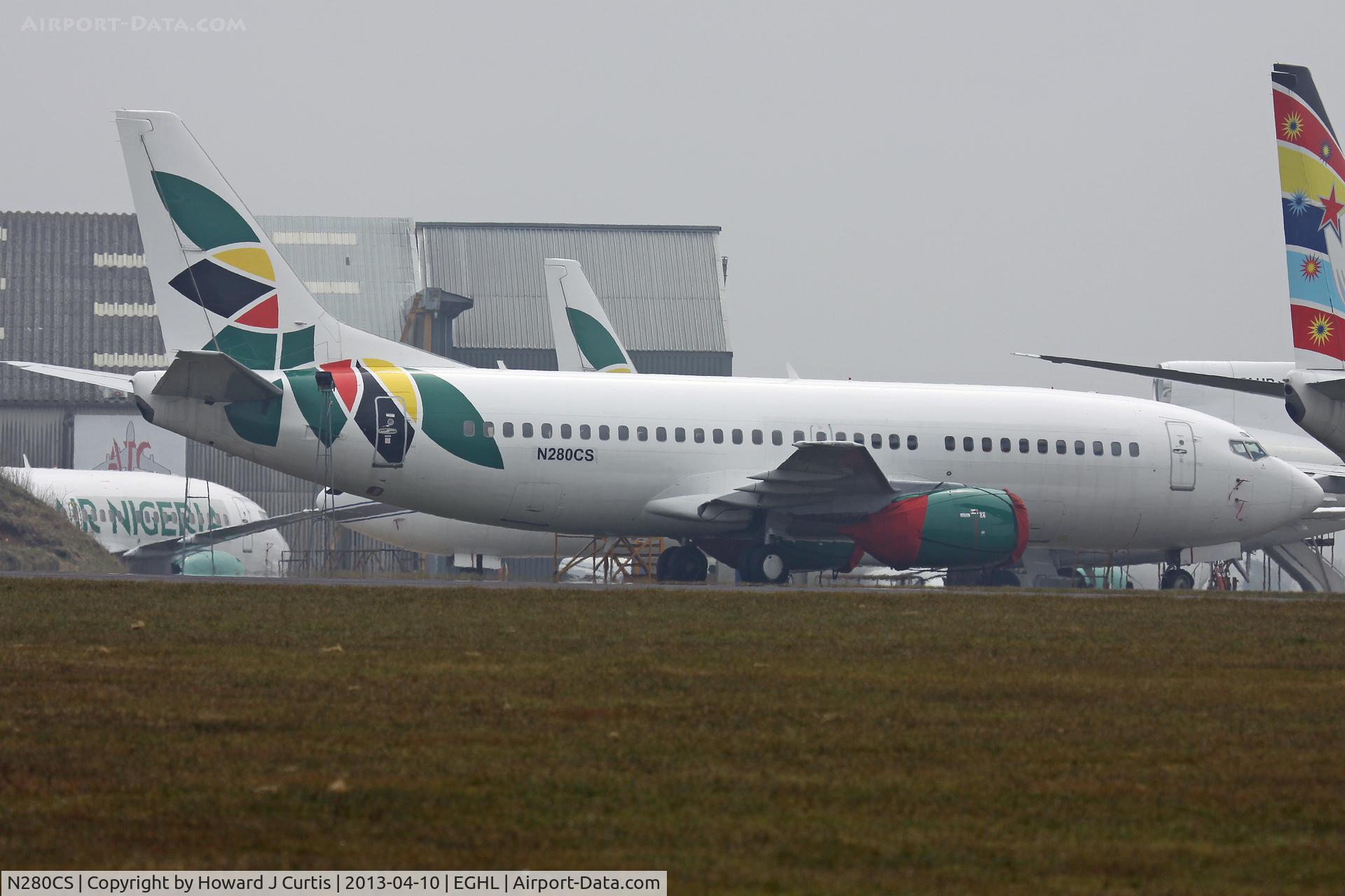 N280CS, 1999 Boeing 737-33V C/N 29338, Basic Air Nigeria colours.