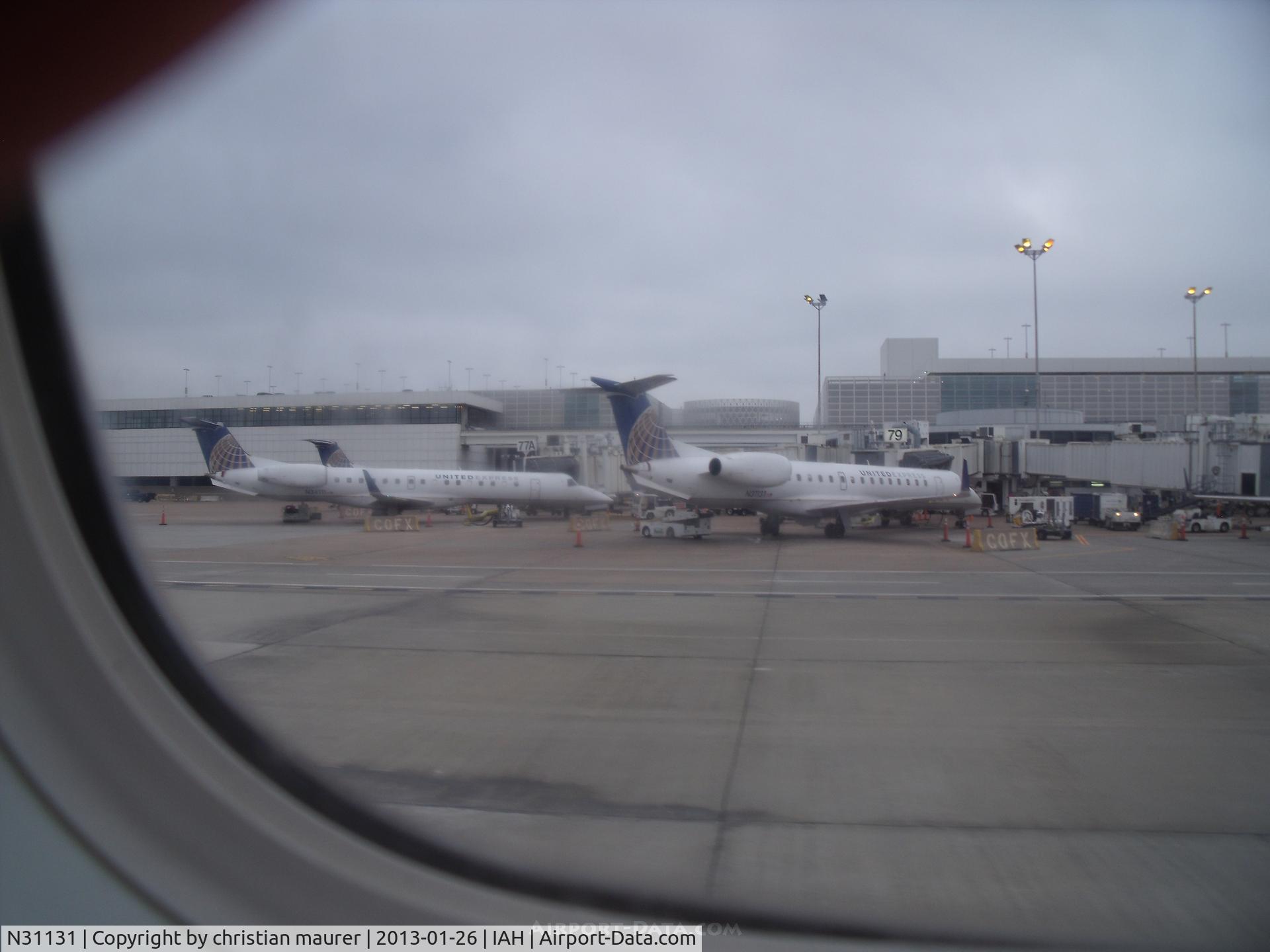 N31131, 2003 Embraer ERJ-145XR (EMB-145XR) C/N 145705, united express erj-145xr parked