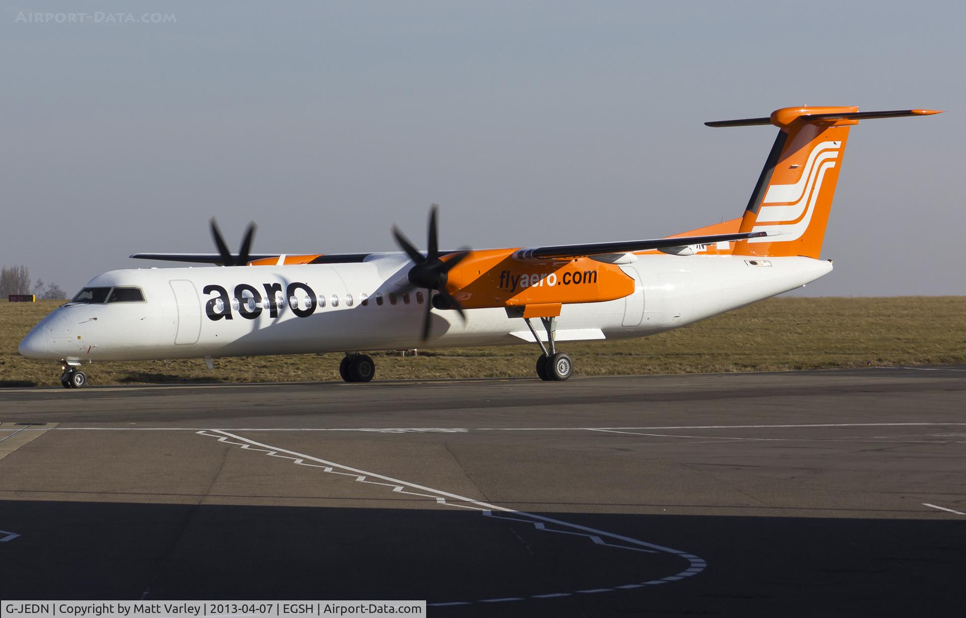G-JEDN, 2003 De Havilland Canada DHC-8-402Q Dash 8 C/N 4078, Taxiing to stand 7 for de-icing.