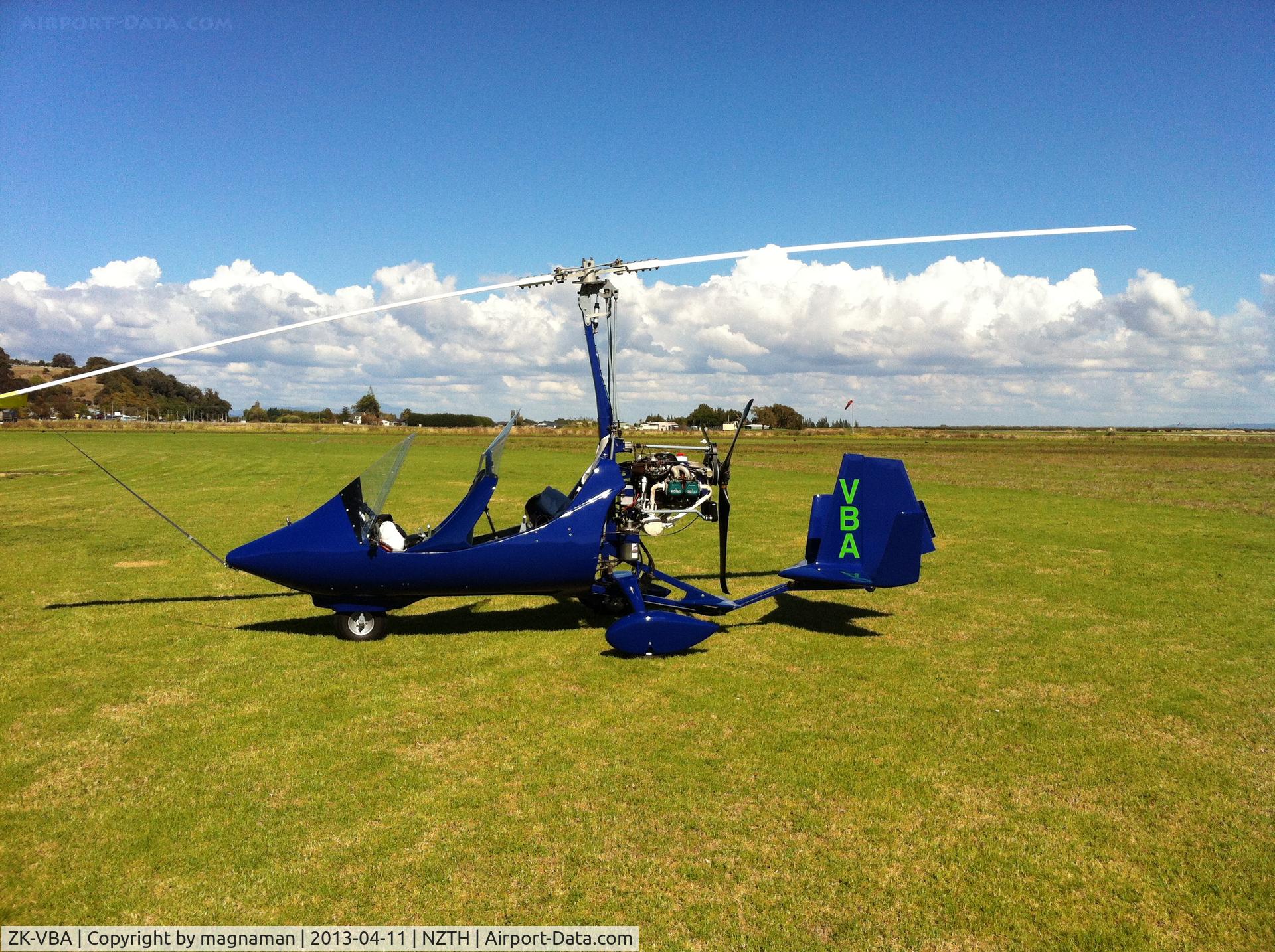 ZK-VBA, ELA Aviacion Gyrocopter C/N ELA07R, I just love these gyrocopter type aircraft.
This had just arrived before me apparently at Thames yesterday. The grass,sky and sun show it off perfectly.