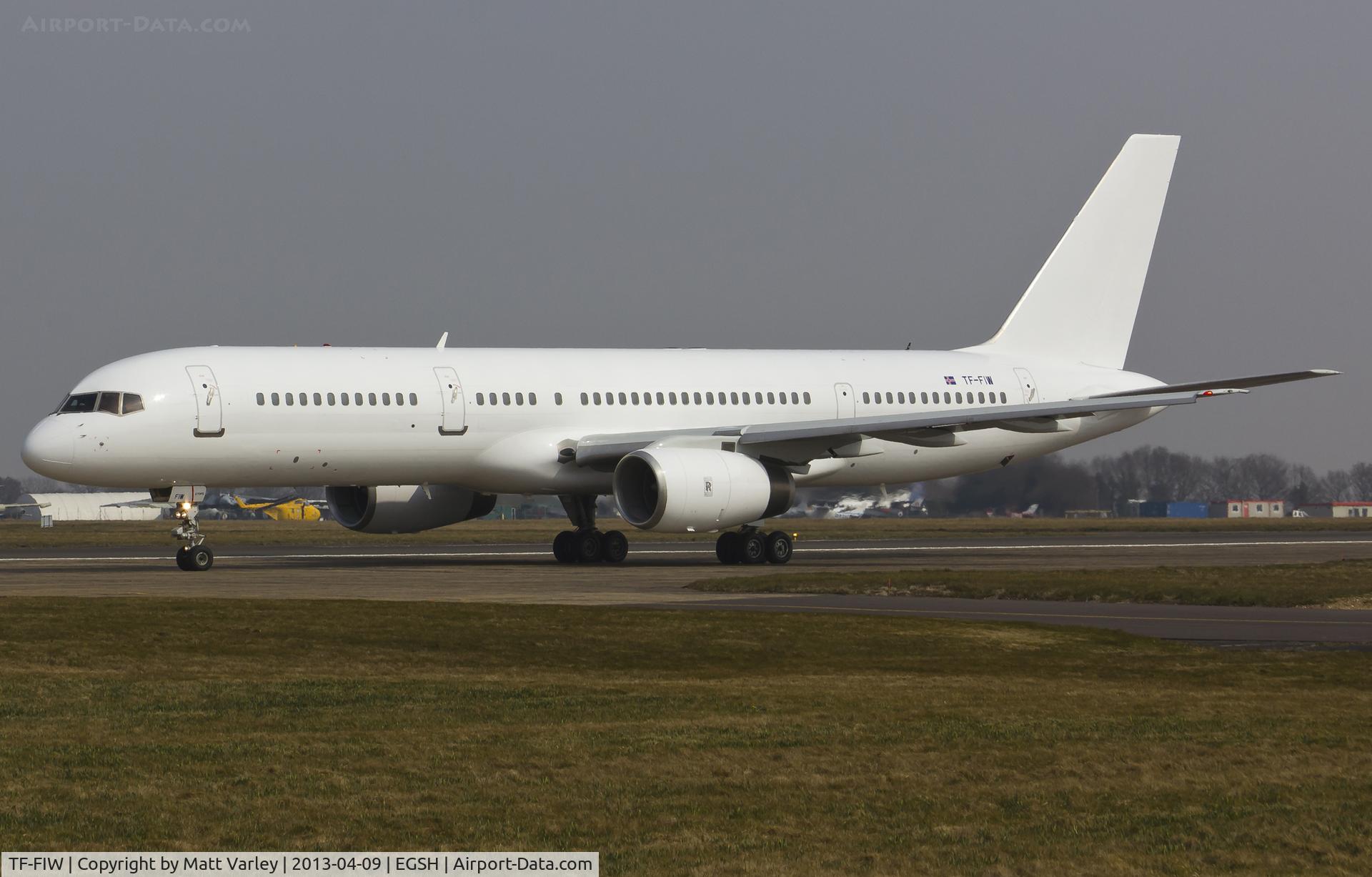 TF-FIW, 1990 Boeing 757-27B/ER C/N 24838, Departing EGSH after spray.