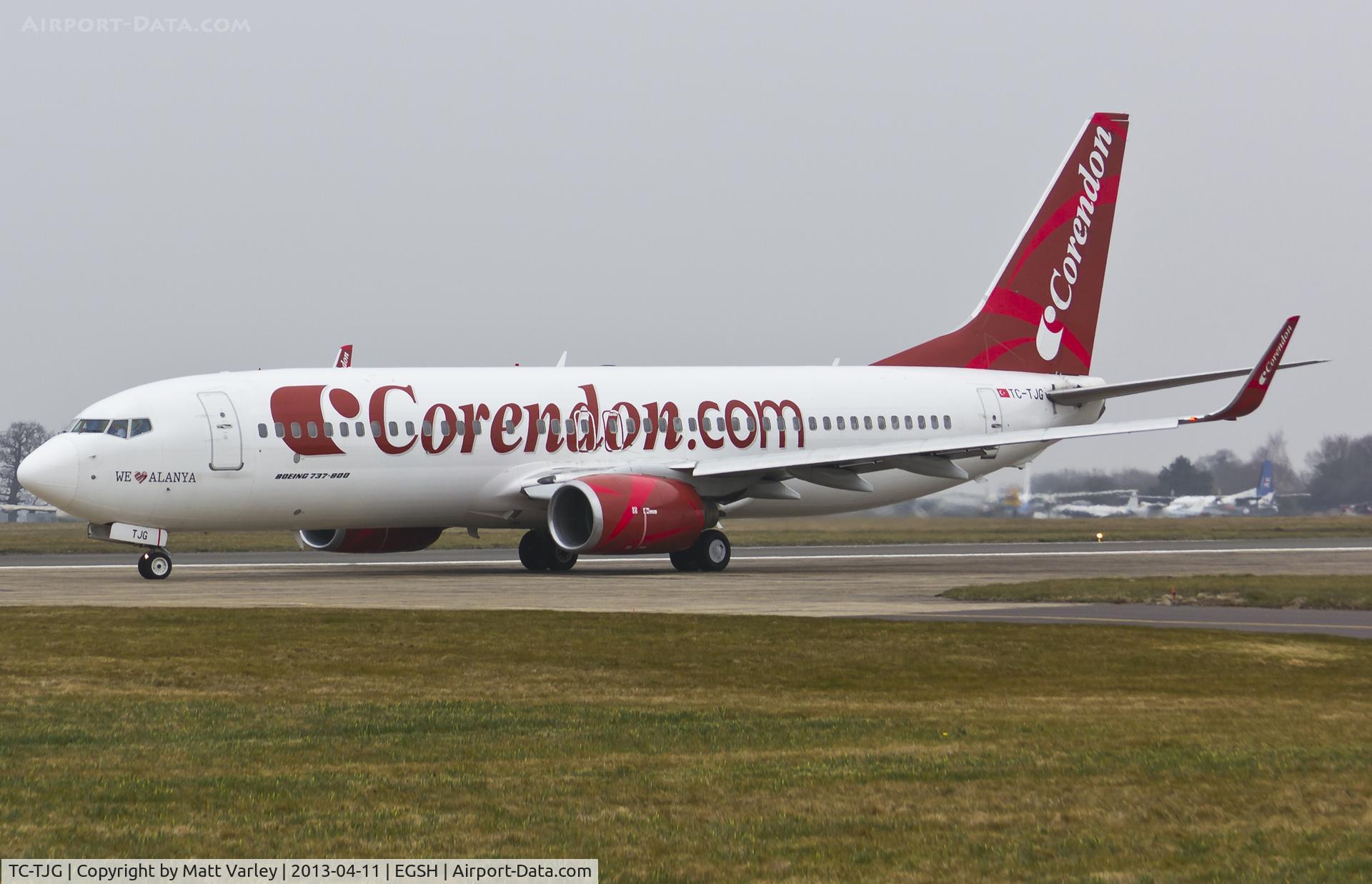 TC-TJG, 1999 Boeing 737-86J C/N 29120, Departing a gloomy EGSH.