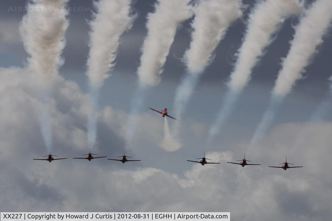 XX227, 1978 Hawker Siddeley Hawk T.1A C/N 063/312063, For 2012 after a tragic 2011, the Red Arrows flew seven aircraft at displays. Here they are breaking for landing.