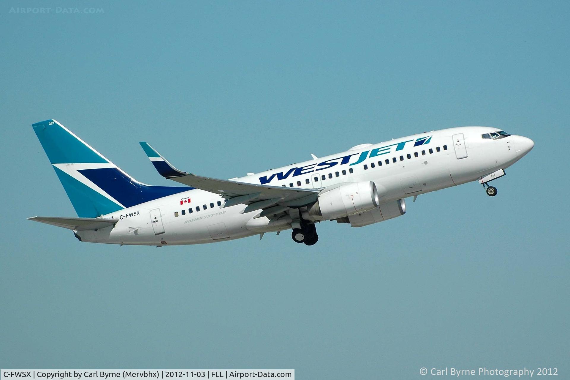 C-FWSX, 2004 Boeing 737-7CT C/N 32761, Taken from the Hibiscus car park viewing area.