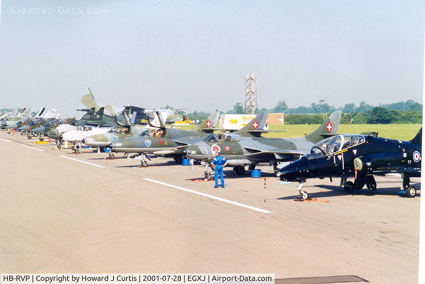 HB-RVP, 1976 Hawker Hunter T.68 C/N HABL-003221, One of several Hunters in the flight line. At IAT.