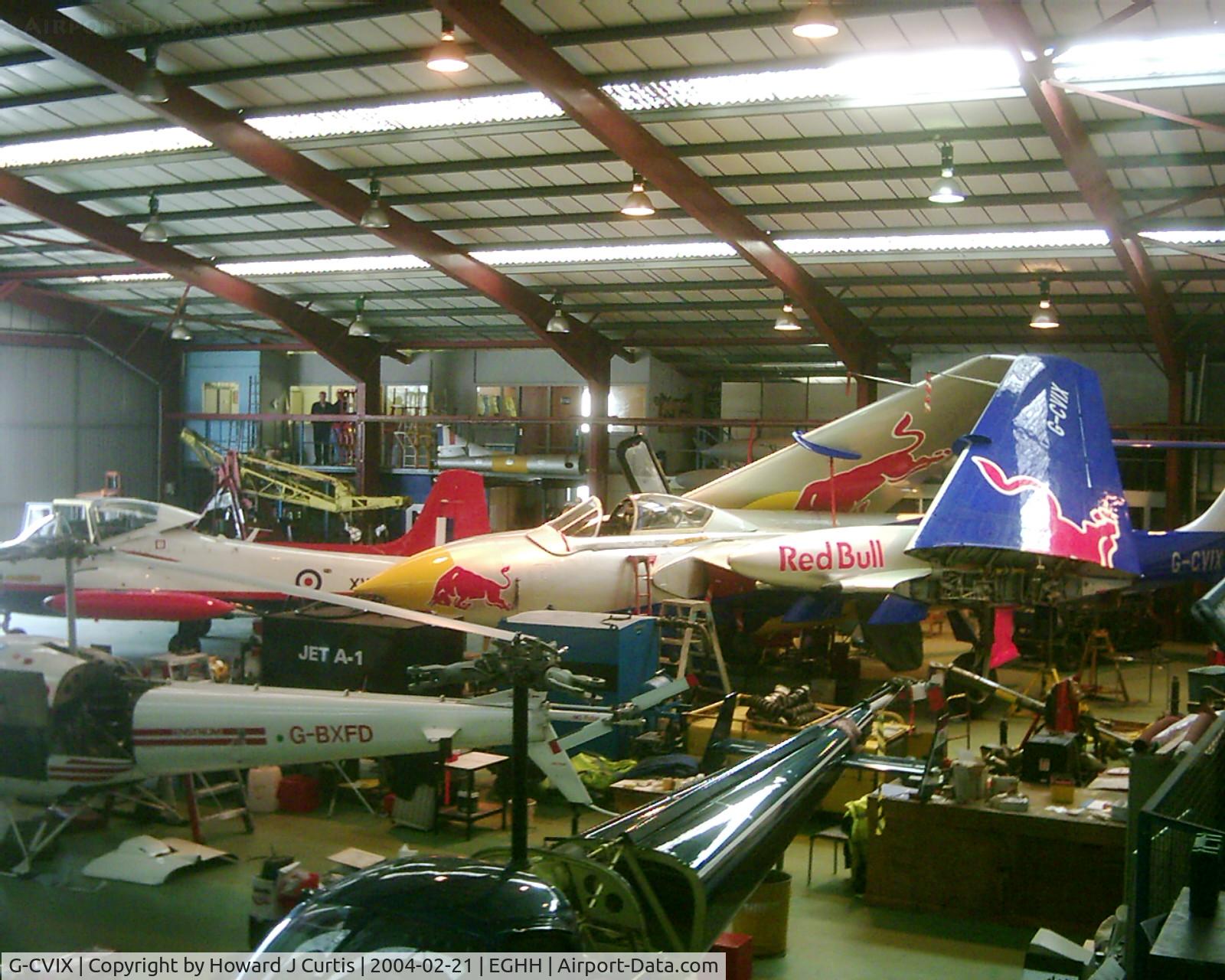 G-CVIX, 1963 De Havilland DH-110 Sea Vixen D.3 C/N 10132, A view across the engineering hangar at the Bournemouth Aviation Museum.
