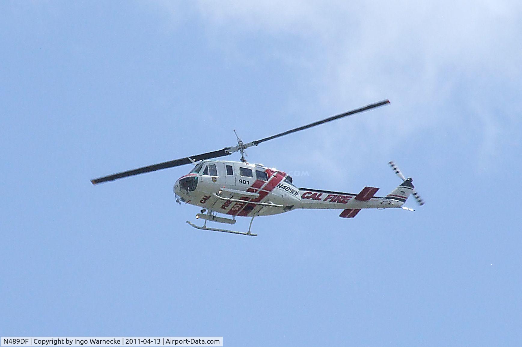 N489DF, 1969 Bell UH-1H Iroquois C/N 12224, Bell EH-1X flying over the Aerospace Museum of California, Sacramento CA