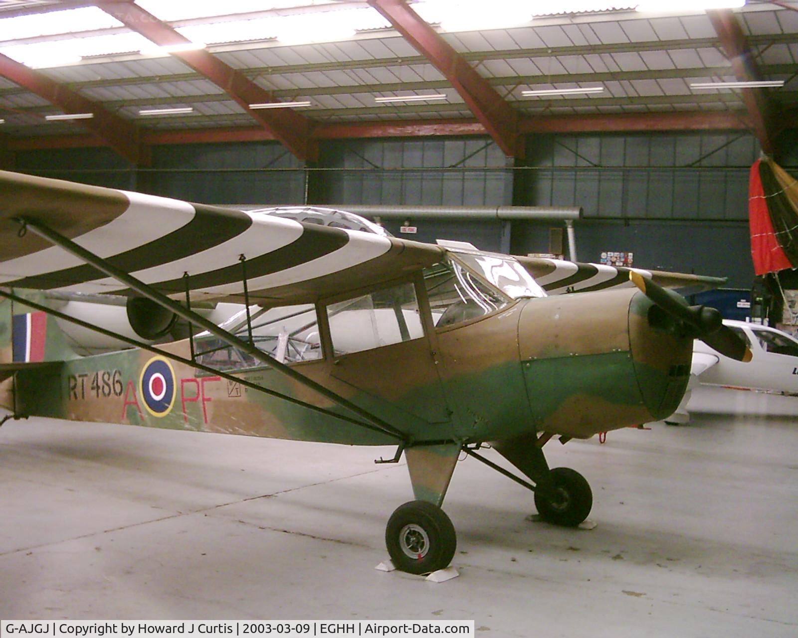 G-AJGJ, 1944 Taylorcraft J Auster 5 C/N 1147, In the Bournemouth Aviation Museum hangar.