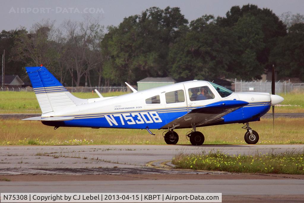 N75308, 1976 Piper PA-28-235 C/N 28-7610119, Departing Jack Brooks with another student learning to fly
