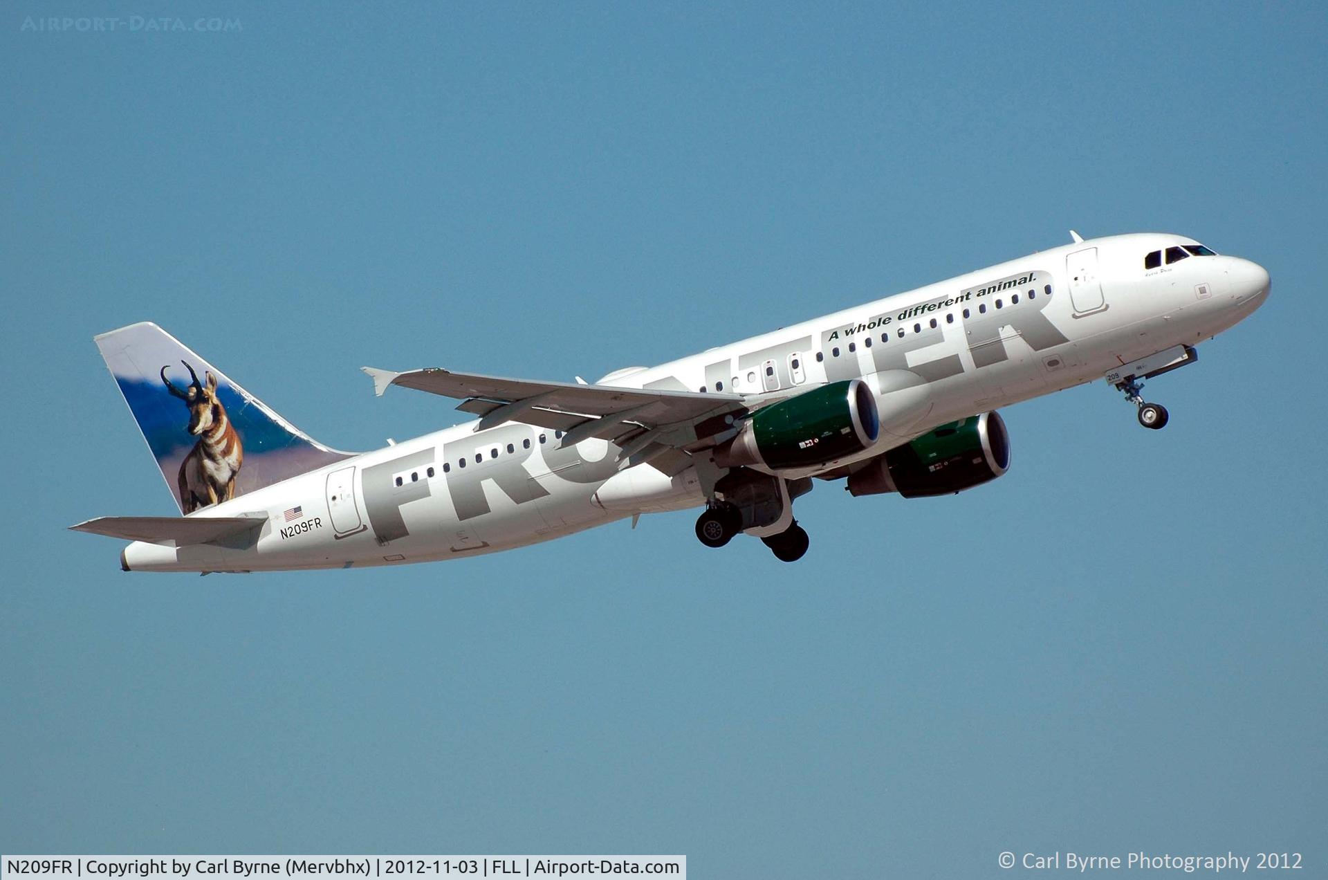 N209FR, Airbus A320-214 C/N 4641, Taken from the Hibiscus car park viewing area.
