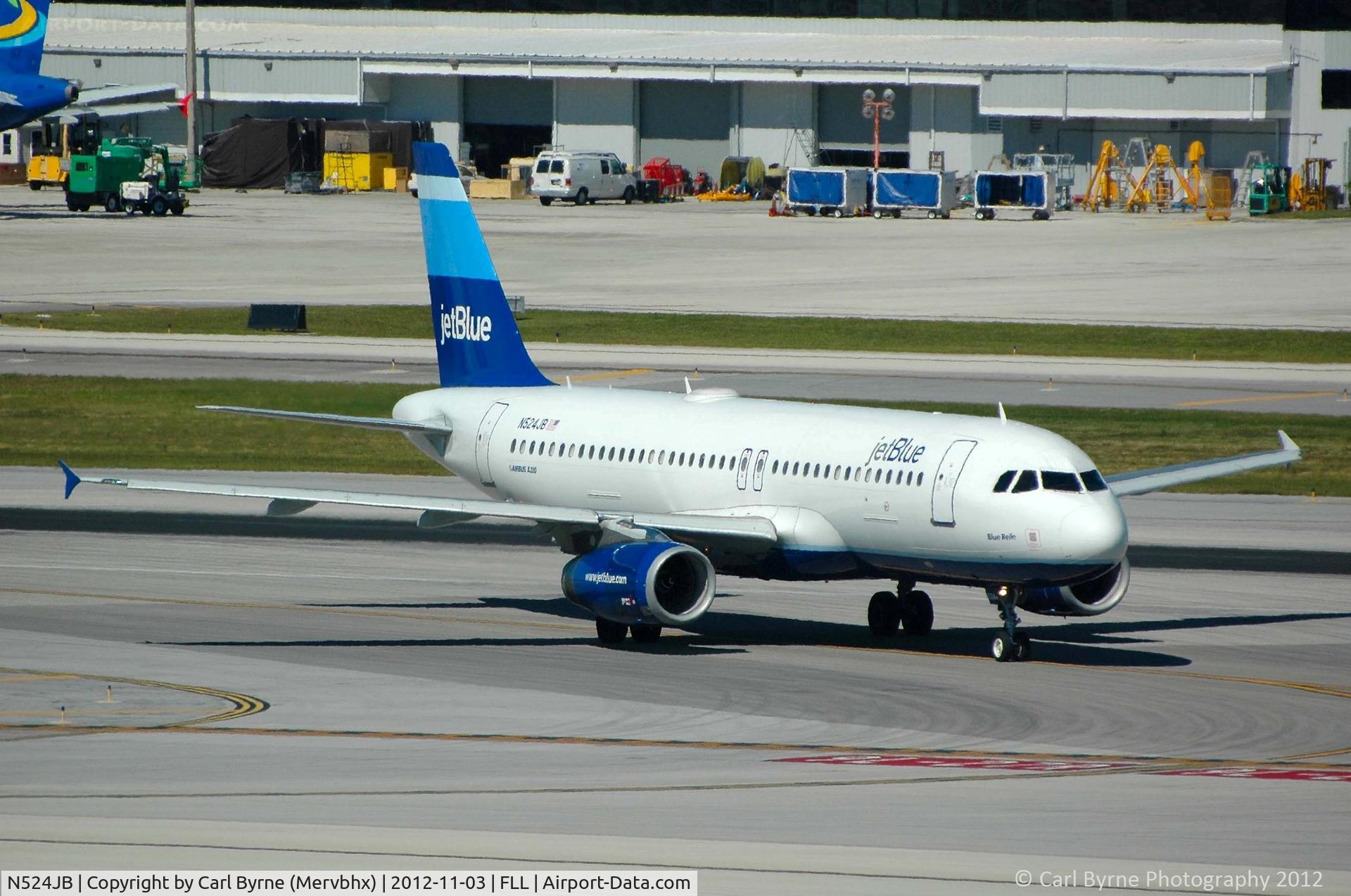 N524JB, 2001 Airbus A320-232 C/N 1528, Taken from the Hibiscus car park viewing area.