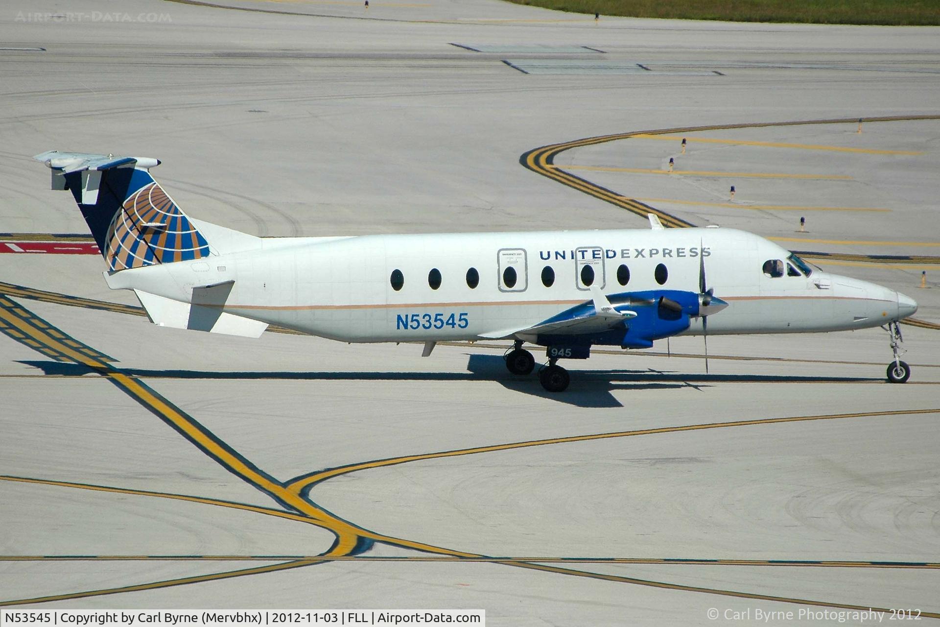 N53545, 1995 Beech 1900D C/N UE-185, Taken from the Hibiscus car park viewing area.