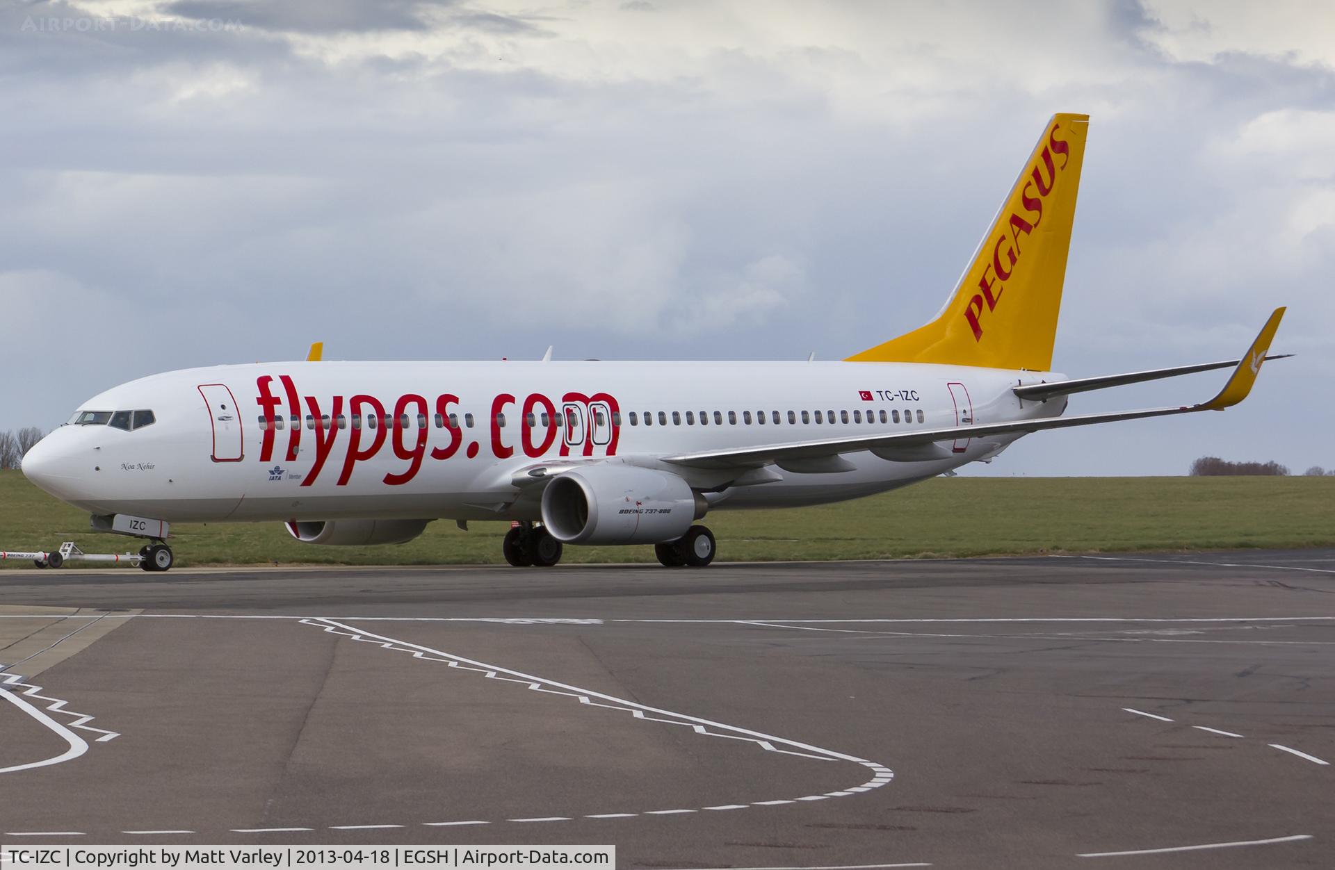 TC-IZC, 2009 Boeing 737-86J C/N 37745, Being towed to stand after spray.