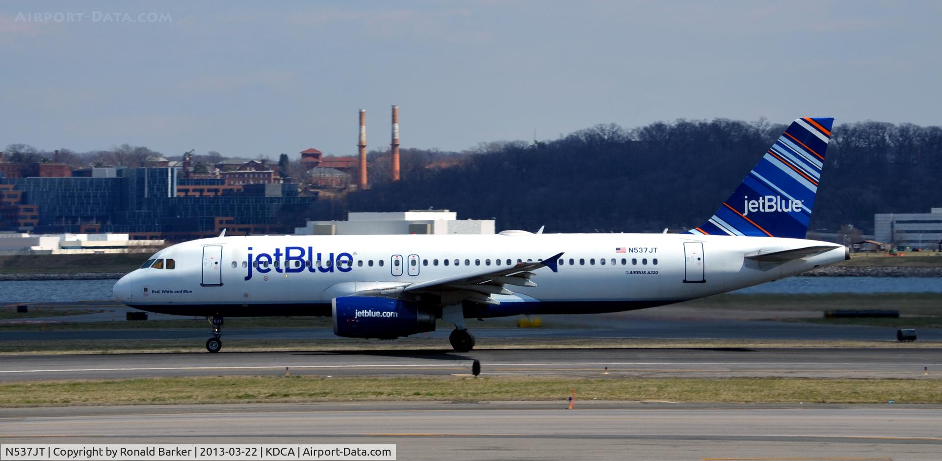 N537JT, 2002 Airbus A320-232 C/N 1785, Red White and  Blue takeoff DCA