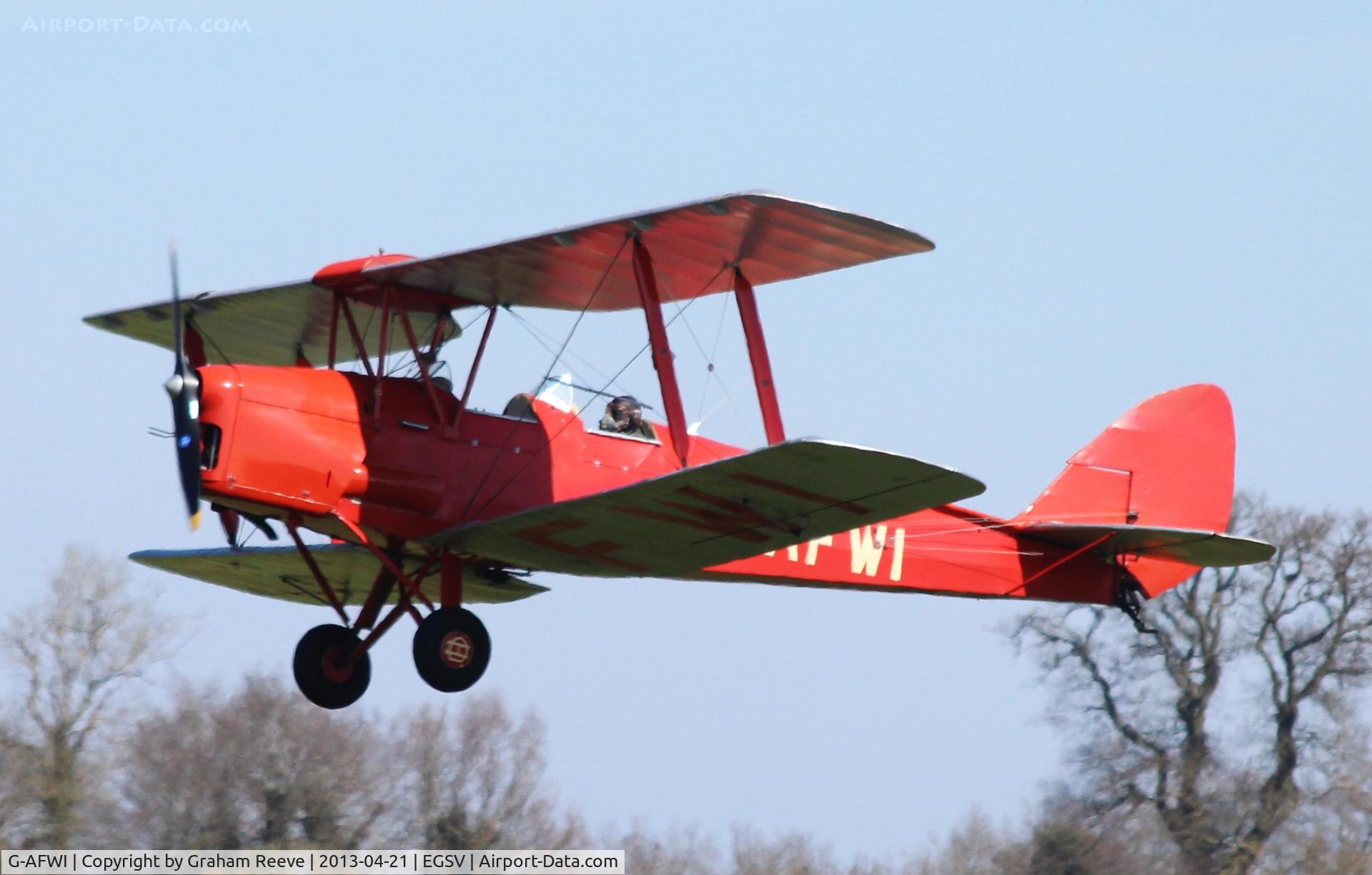 G-AFWI, 1939 De Havilland DH-82A Tiger Moth II C/N 82187, Just airbourne.