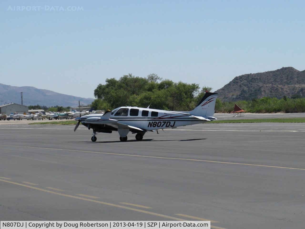 N807DJ, 2001 Raytheon Aircraft Company A36 Bonanza C/N E-3371, 2001 Raytheon Beech A36 BONANZA, Continental IO-550-B 300 Hp, six place, taxi off the active