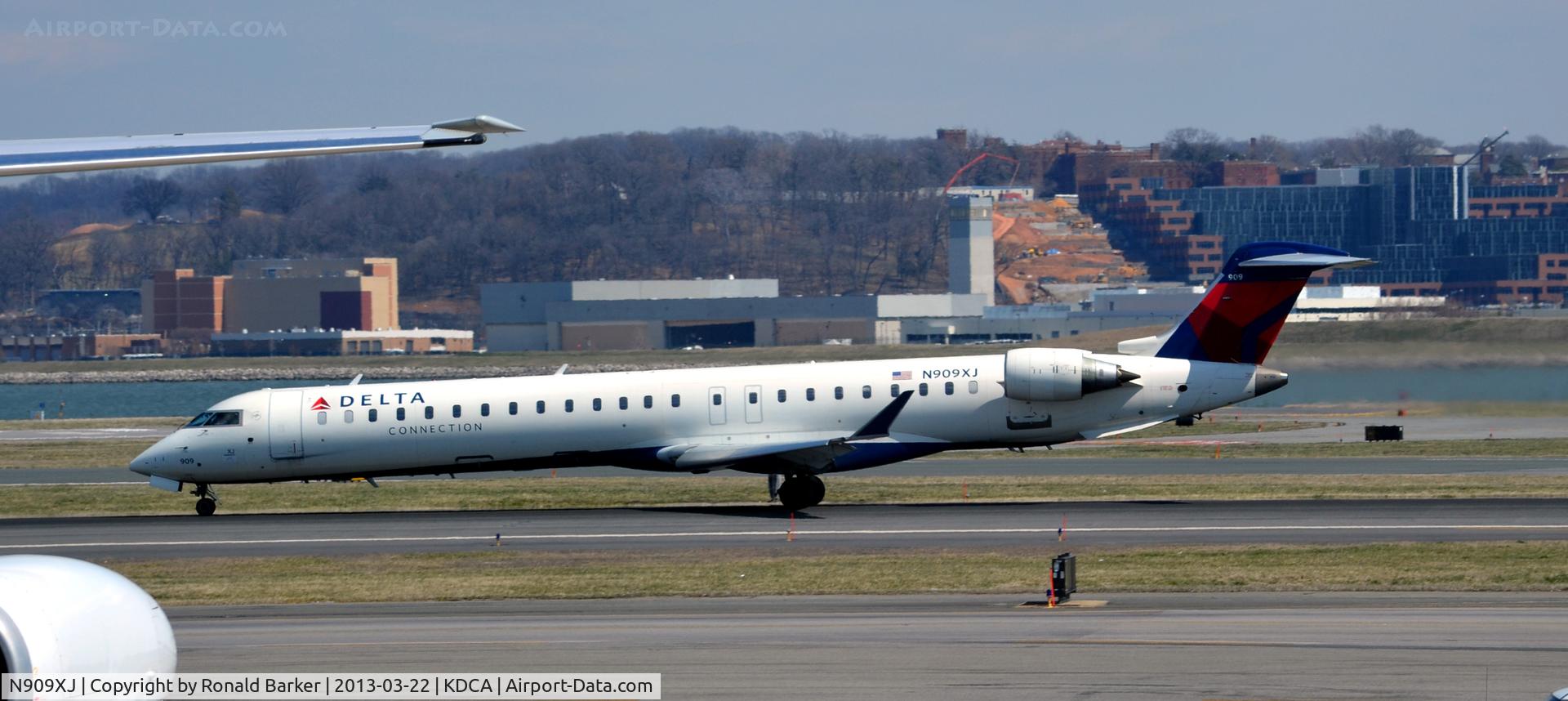 N909XJ, 2007 Bombardier CRJ-900ER (CL-600-2D24) C/N 15141, Takeoff DCA