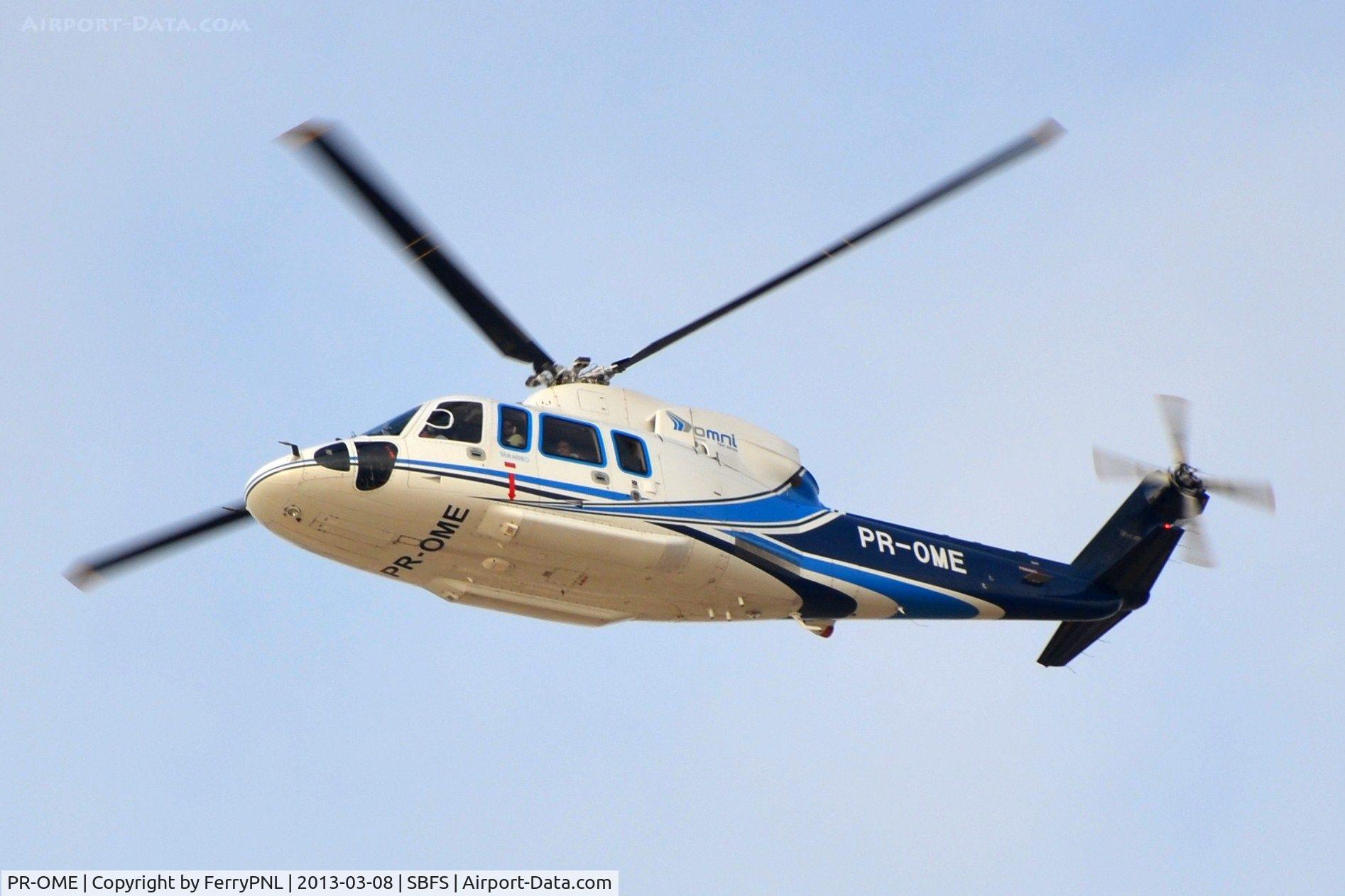 PR-OME, 2009 Sikorsky S-76C++ C/N 760792, Crossing the beach at Sao Tome, RJ after taking-off from local heliport.