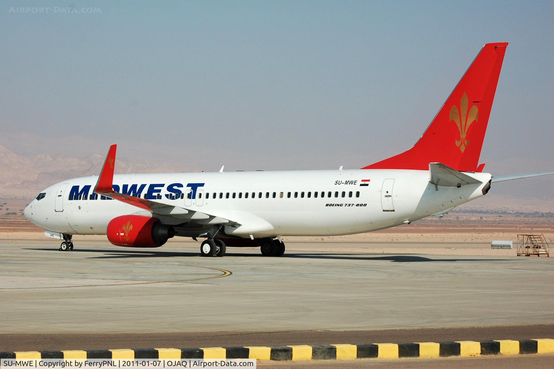 SU-MWE, 2005 Boeing 737-8Q8 C/N 30040, B738 of Midwest parked for the day at Aqaba, Jordan while the pax visit Petra world heritage site.