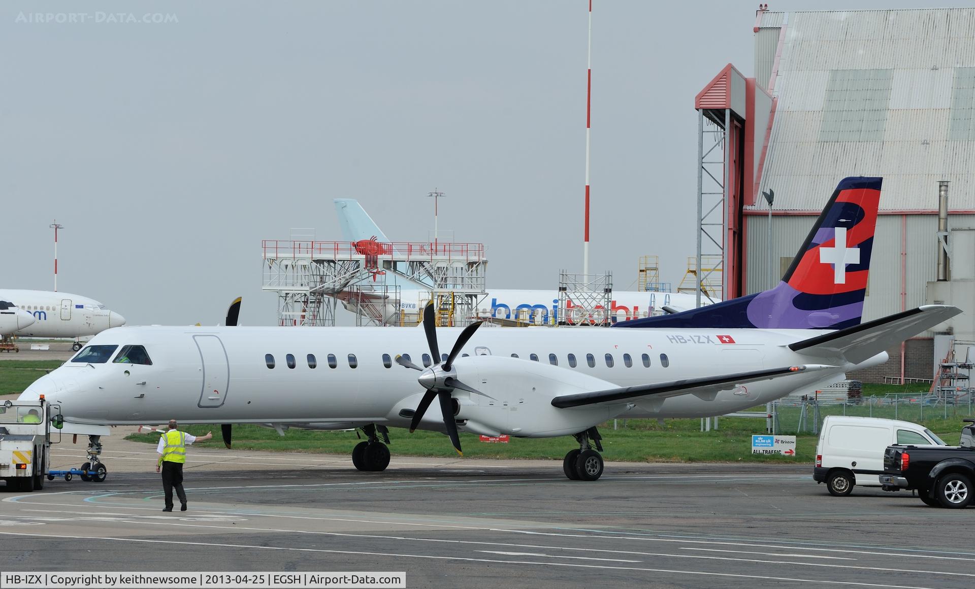 HB-IZX, 1996 Saab 2000 C/N 2000-041, Formerly YR-SBE being towed from spray shop in new colour scheme ???