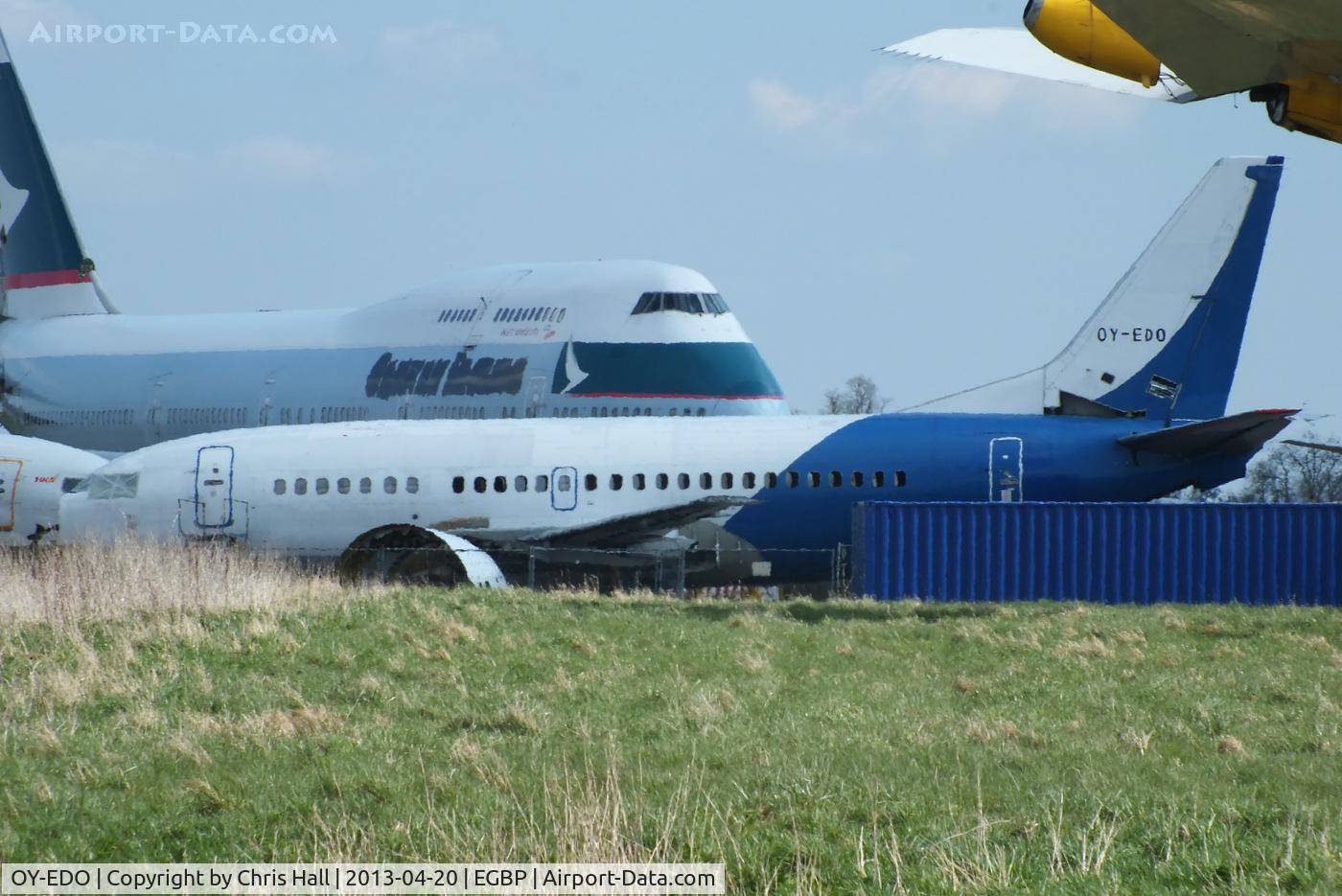 OY-EDO, 1992 Boeing 737-548 C/N 25738, now in the scrapping area at Kemble