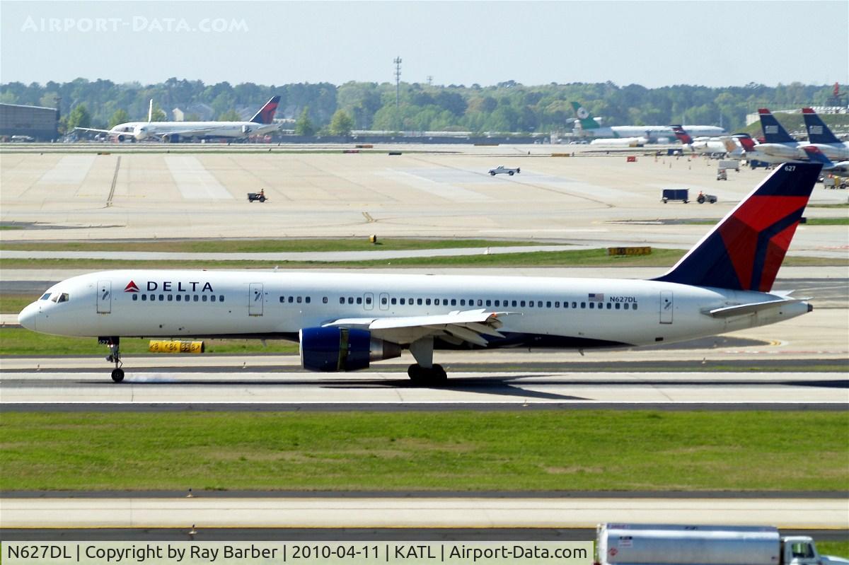 N627DL, 1987 Boeing 757-232 C/N 22917, Boeing 757-232 [22917] (Delta Air Lines) Atlanta-Hartsfield~N 11/04/2010. Kicking up a little smoke as the front wheel touches down.