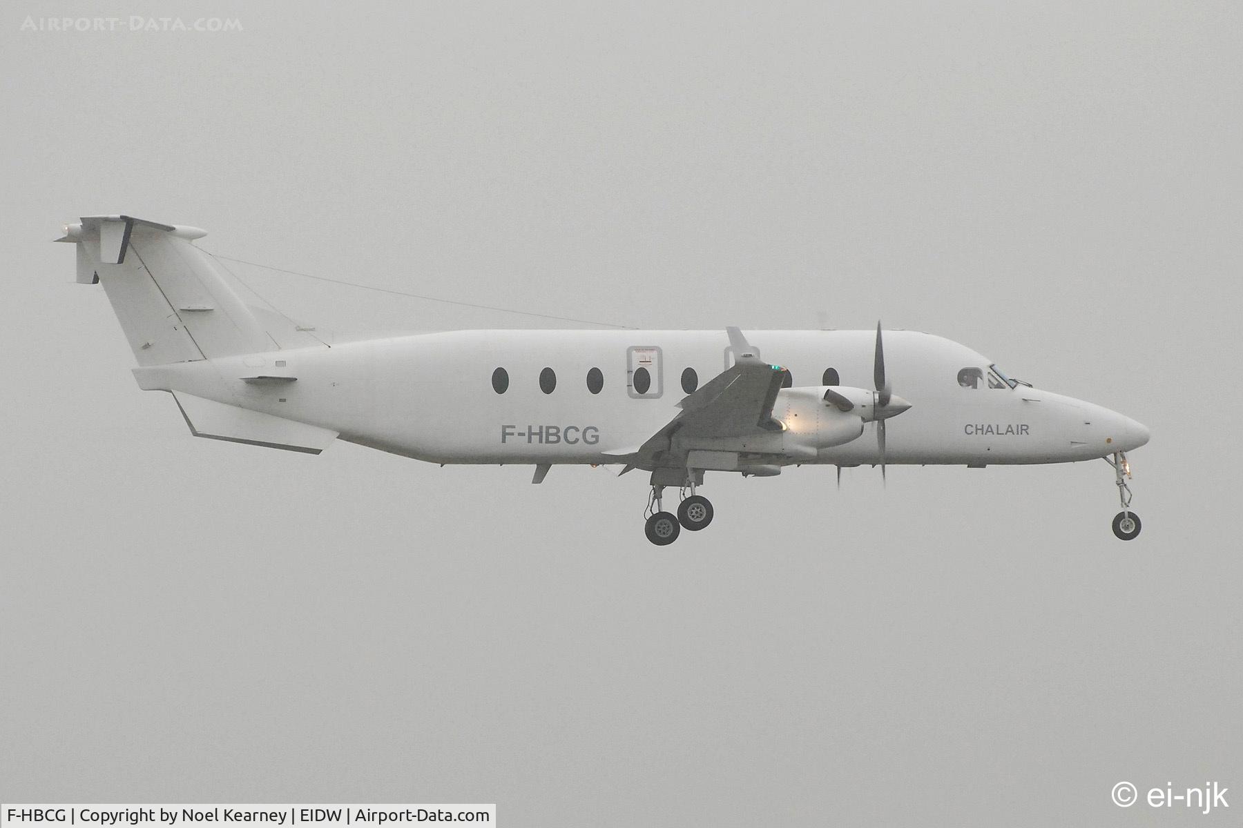 F-HBCG, 1993 Beech 1900D C/N UE-70, Photographed landing at Dublin in the rain.
