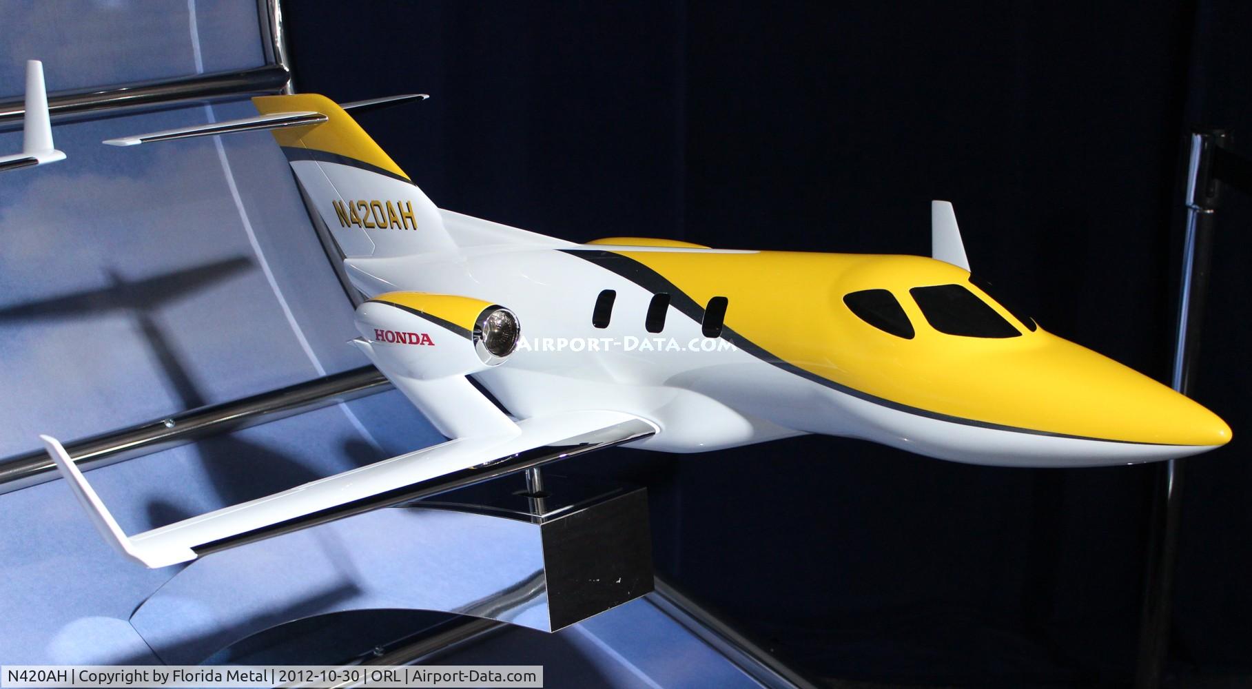 N420AH, 2012 Honda HA-420 HondaJet C/N 42000003, Honda HA-420 scale model at NBAA Orlando