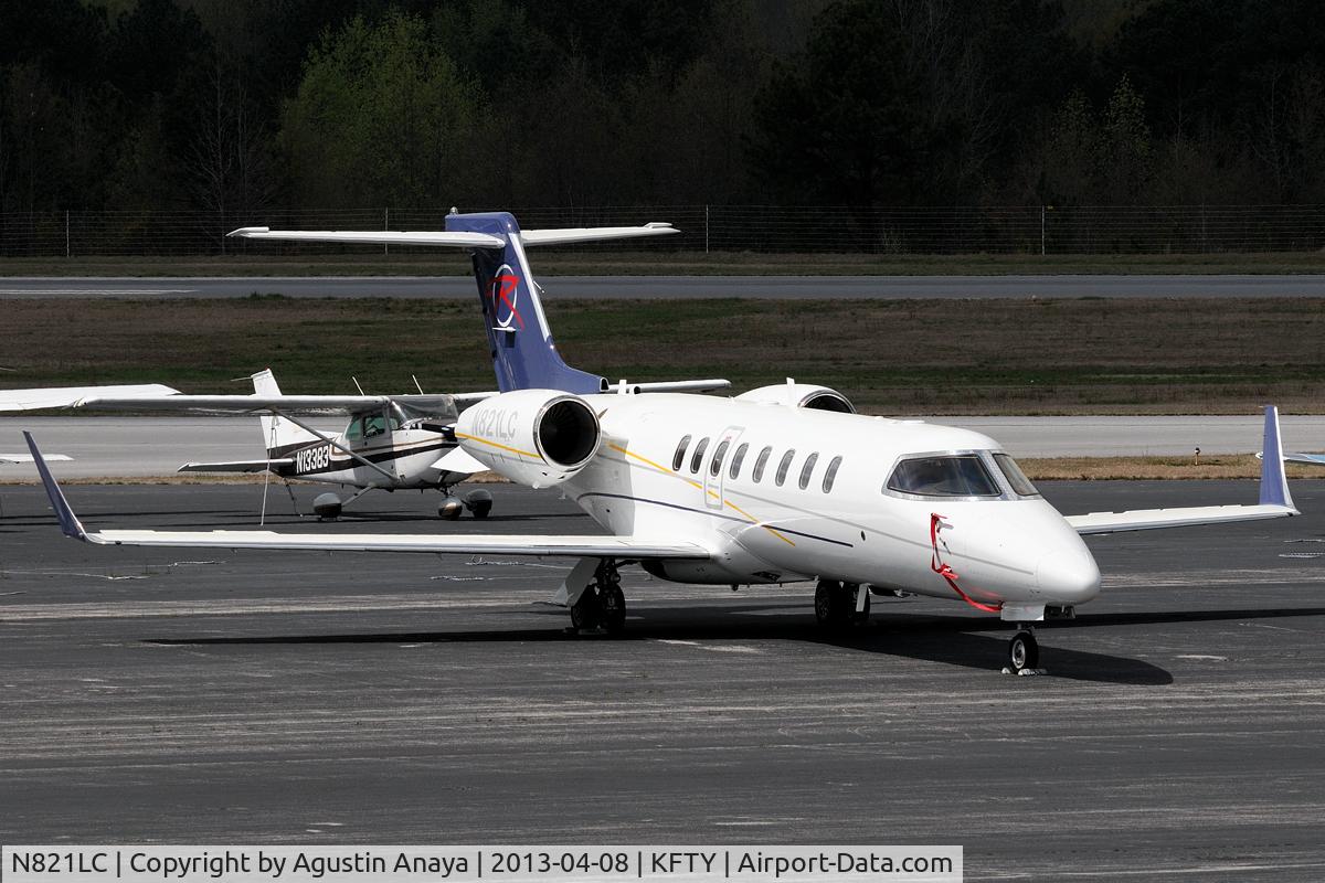 N821LC, 2010 Learjet 45 C/N 406, Parked at the Signature ramp.