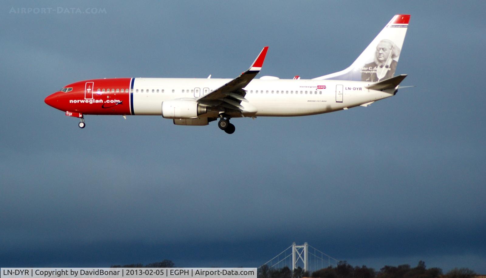 LN-DYR, 2011 Boeing 737-8JP C/N 40870, Arriving from Oslo in brooding Winter light. The Forth Road Bridge highlighted in the background