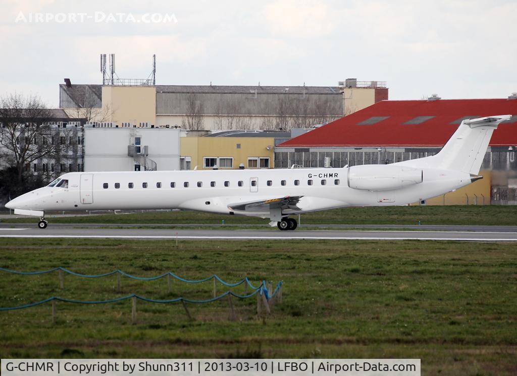 G-CHMR, 2001 Embraer EMB-145MP (ERJ-145MP) C/N 145405, Ready for take off rwy 32R in all white c/s with small Eastern Airlines titles near door