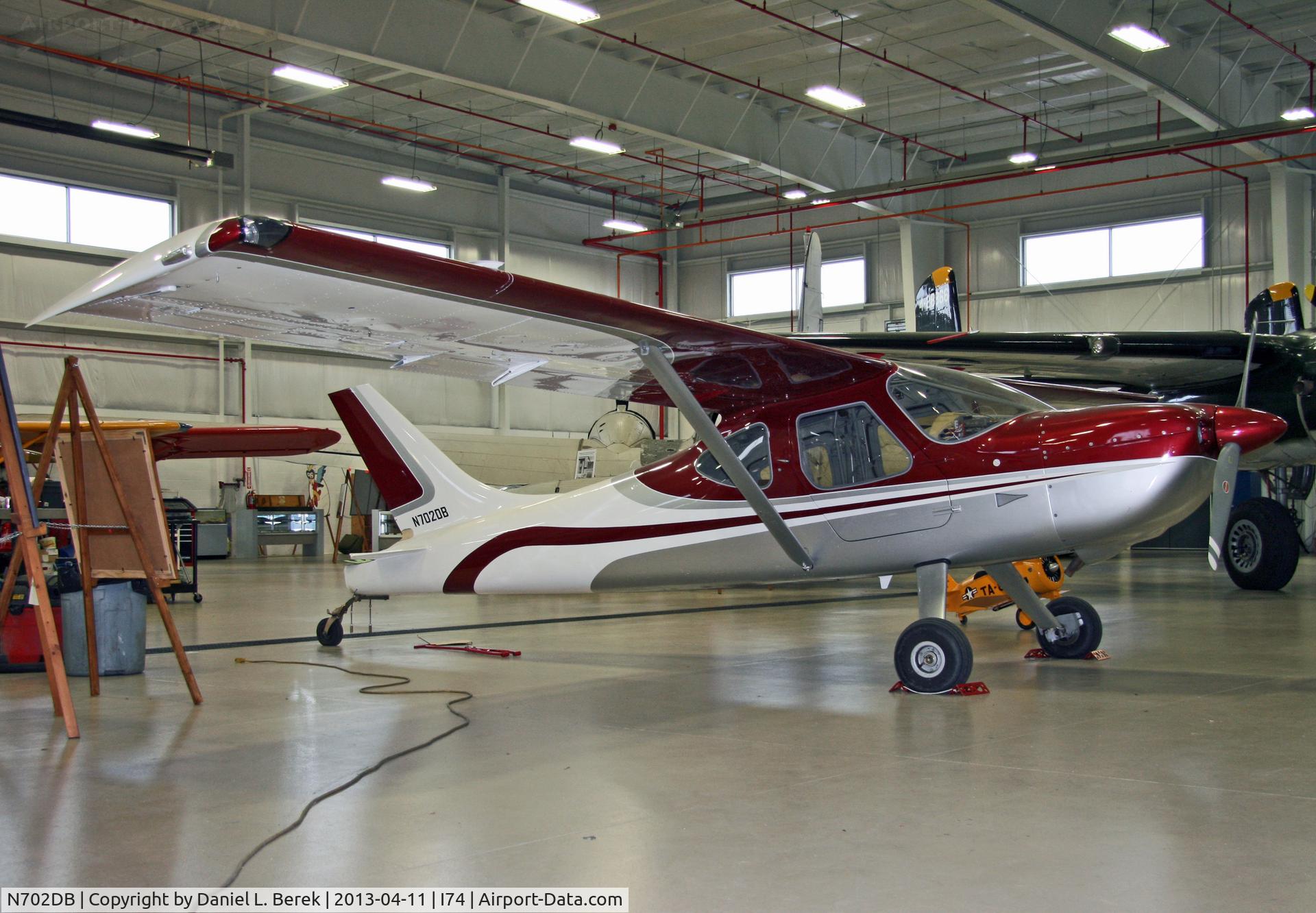 N702DB, 2008 Glasair GS-2 Sportsman C/N 7139, A sleek new bird receives attention to her rudder in the hanger of the Champaign Aviation Museum.