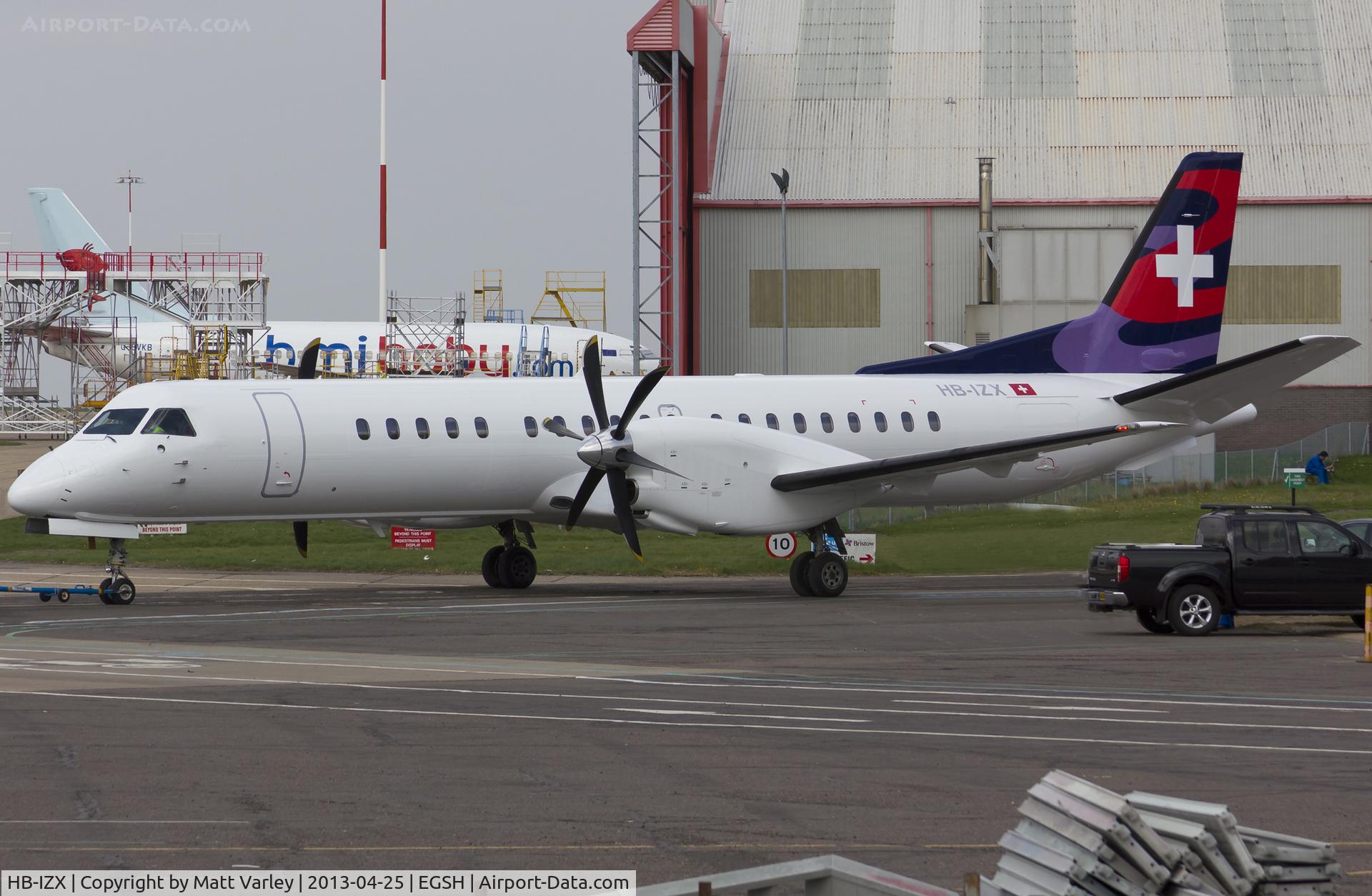 HB-IZX, 1996 Saab 2000 C/N 2000-041, Fresh from spray in Darwin C/S.