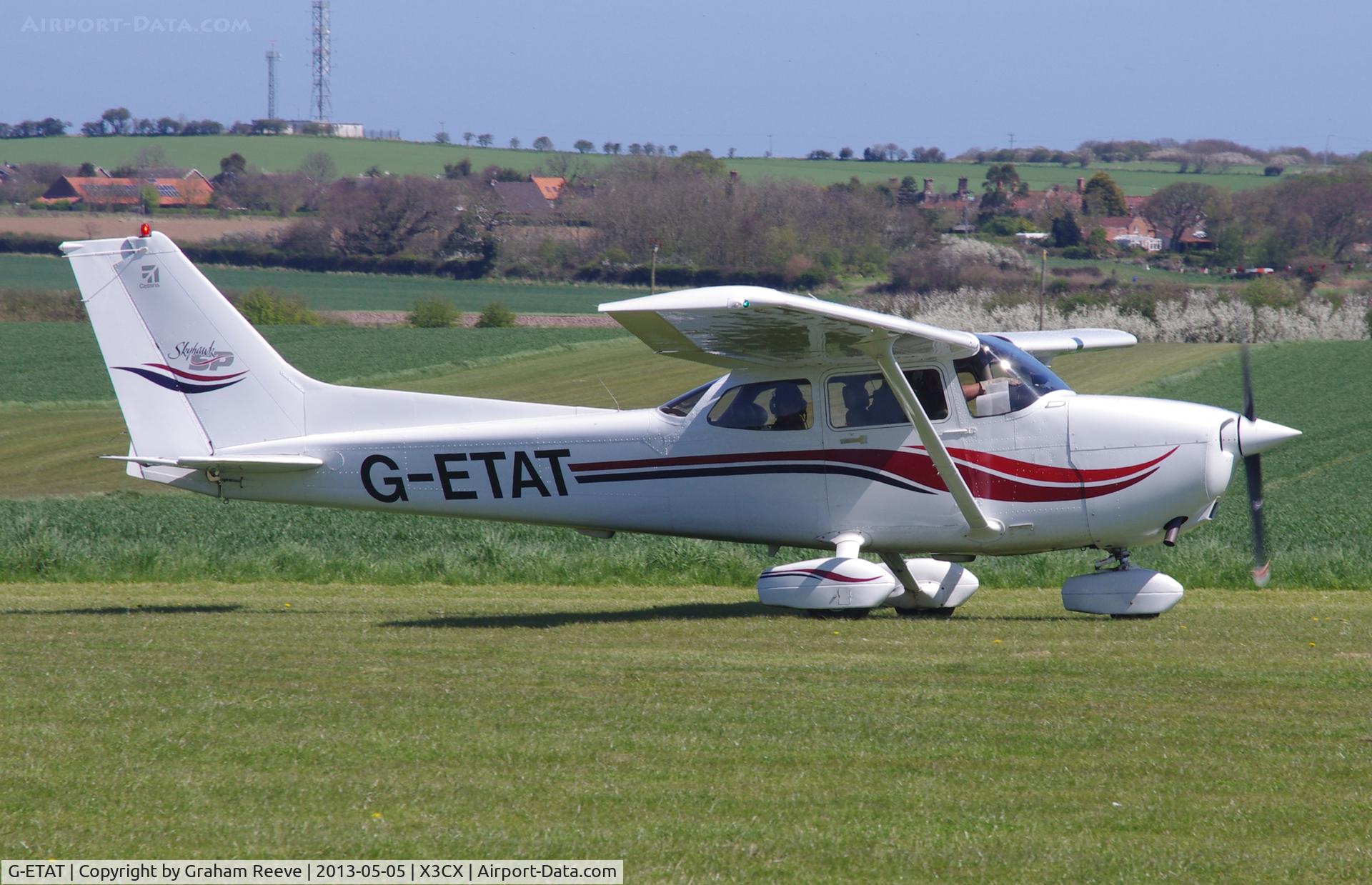 G-ETAT, 2000 Cessna 172S Skyhawk SP C/N 172S8674, Just landed at Northrepps.